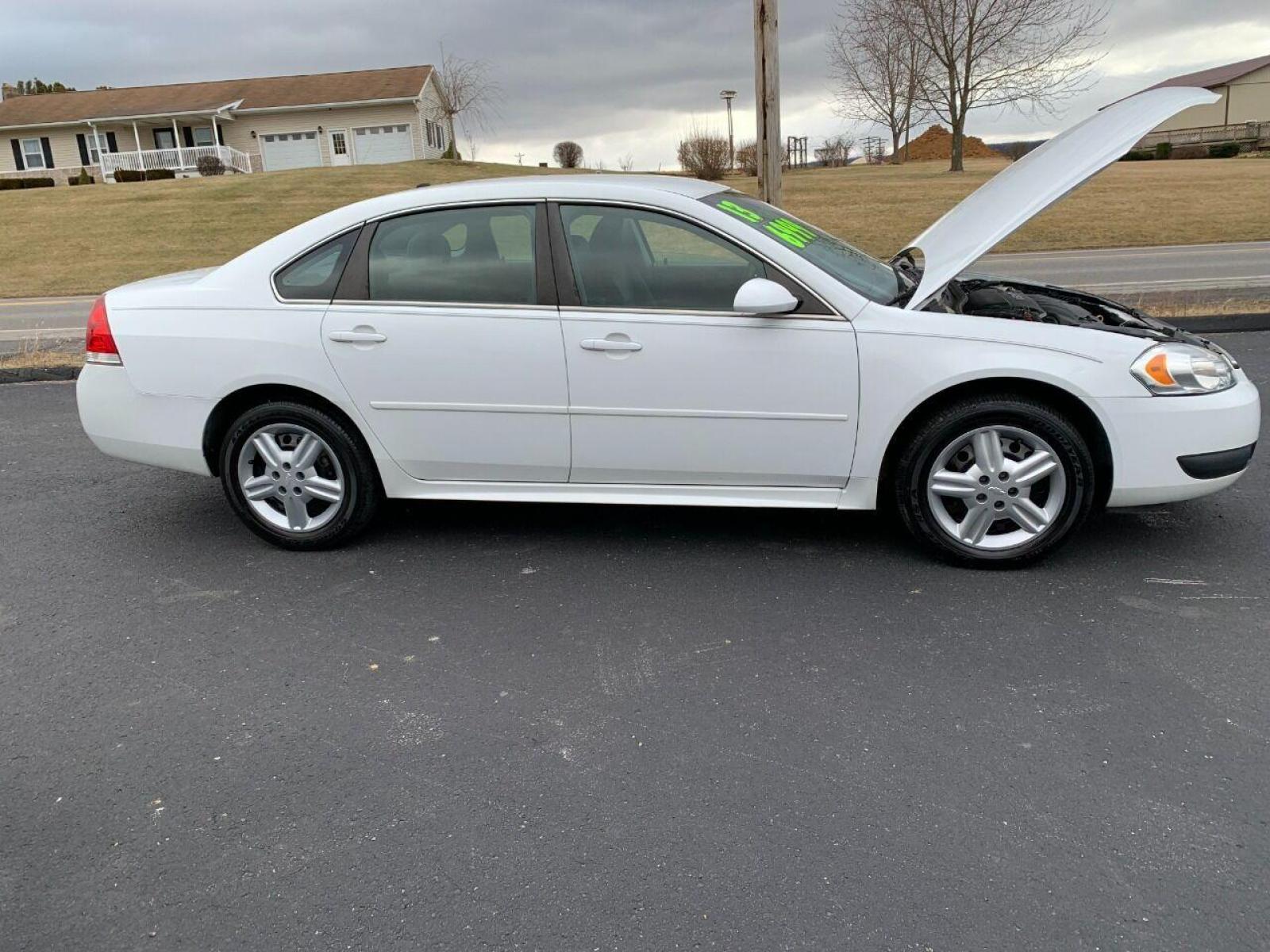 2013 White Chevrolet Impala (2G1WD5E30D1) with an 3.6L V6 3.6L V6 engine, located at 4845 Woodbury Pike, Roaring Springs, PA, (814) 317-5008, (814) 317-5008, 40.250935, -78.366959 - Photo #3