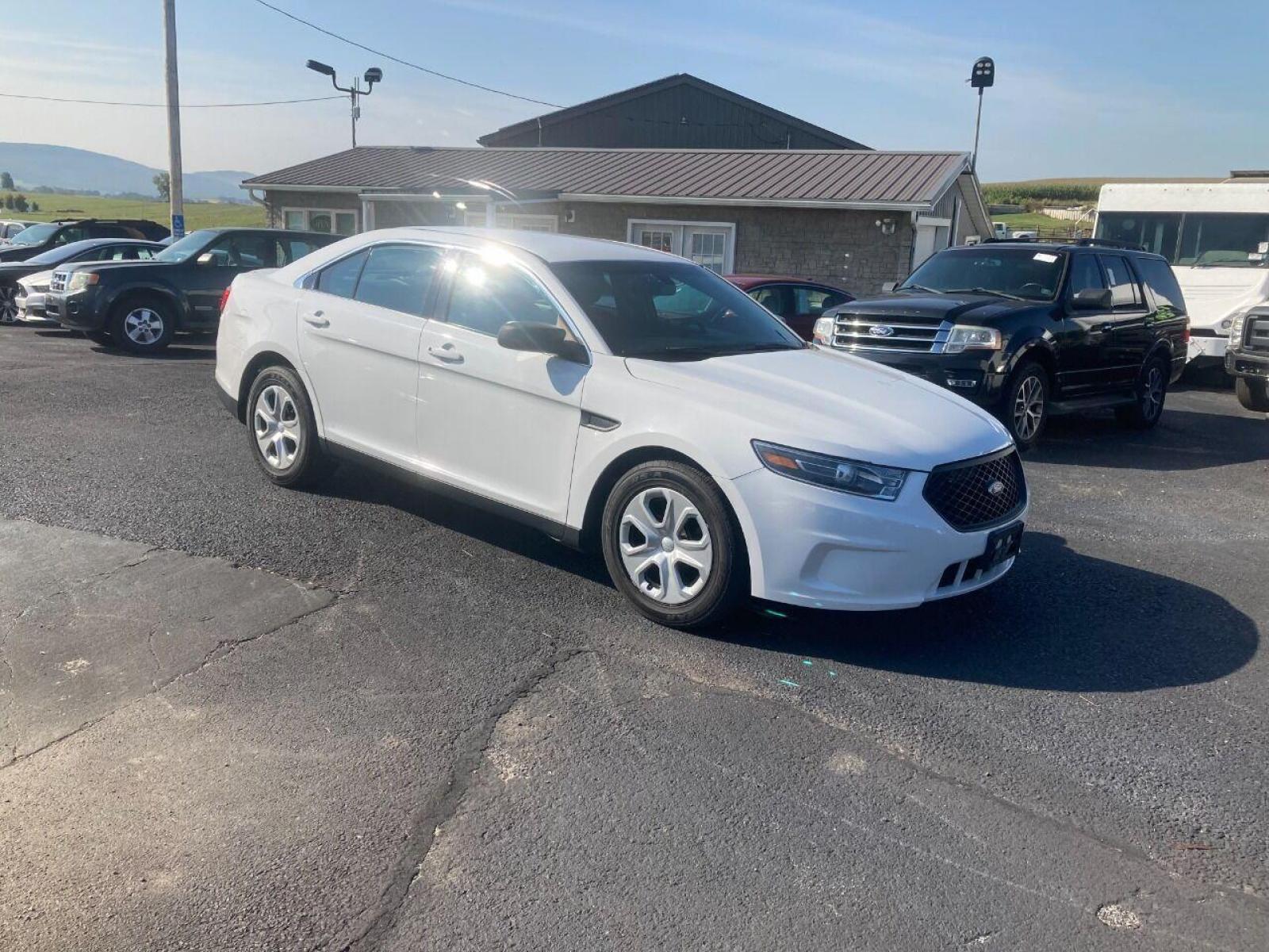 2018 White Ford Taurus (1FAHP2MK7JG) with an 3.7L V6 3.7L V6 engine, located at 4845 Woodbury Pike, Roaring Springs, PA, (814) 317-5008, (814) 317-5008, 40.250935, -78.366959 - 1 Owner! 2018 Ford Taurus Police Interceptor, 126k, AWD, 3.7L, V6, Flex fuel, Southern car! Like new tires! New inspection! Super clean ready to go! This vehicle did not have cage or any rear modifications, power windows/locks, cruise/tilt wheel, air conditioning, rear back up. If interested, ple - Photo #0