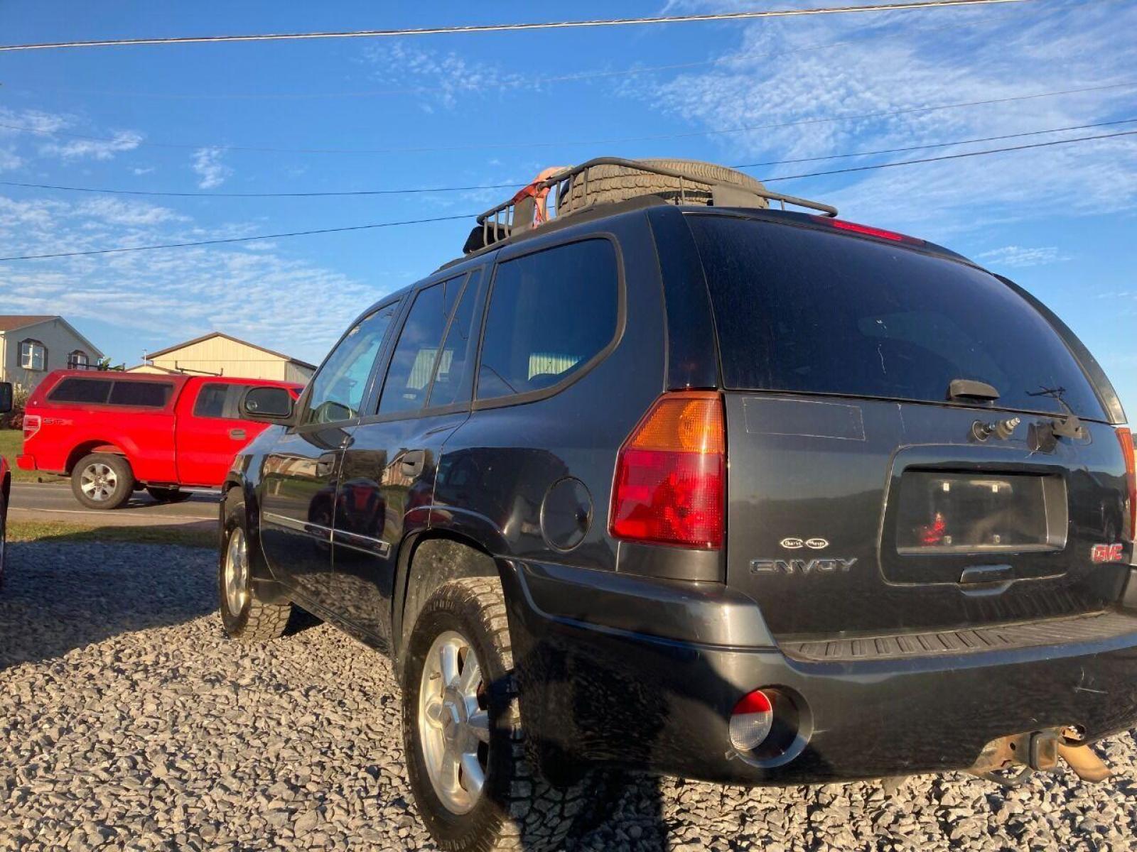 2007 Black GMC Envoy (1GKDT13S172) with an 4.2L I6 4.2L I6 engine, located at 4845 Woodbury Pike, Roaring Springs, PA, (814) 317-5008, (814) 317-5008, 40.250935, -78.366959 - 2007 GMC Envoy, 220k, automatic, 4x4, new tires, new inspection. Southern vehicle! Beautiful undercarriage! Rust free frame! Body is in excellent condition! Runs and drives 100%! If interested, please call 814-317-5008 or 814-497-4383. - Photo #3