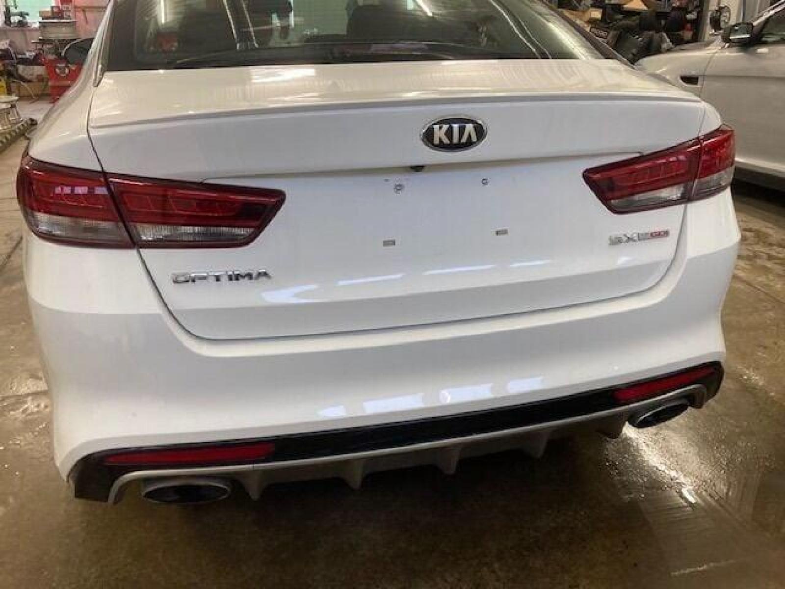 2017 White Kia Optima (5XXGW4L28HG) with an 2.0L I4 Turbocharger 2.0L I4 engine, located at 4845 Woodbury Pike, Roaring Springs, PA, (814) 317-5008, (814) 317-5008, 40.250935, -78.366959 - 2017 Kia Optima SX, turbo, FWD, automatic, 45k, leather, power windows/locks, Bluetooth, aluminum wheels, new tires, new inspection/brakes/rotors, rear back up, steering controls, heated seats and much more. Vehicle is being sold cheap due to having a Reconstructed title. Vehicle had light passeng - Photo #3