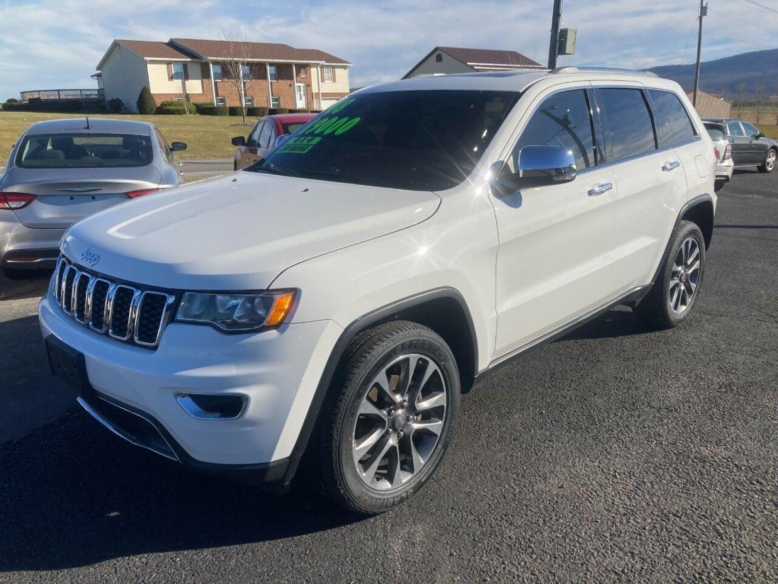 2018 White Jeep Grand Cherokee (1C4RJFBG4JC) with an 3.6L V6 3.6L V6 engine, located at 4845 Woodbury Pike, Roaring Springs, PA, (814) 317-5008, (814) 317-5008, 40.250935, -78.366959 - 2018 Jeep Grand Cherokee, 4x4, V6, automatic, power windows/locks, air conditioning, Navigation, rear back up camera, heated seats, new tires, new inspection and more. Super clean! Will come with a warranty with the option to upgrade. If interested, please call 814-317-5008 or 814-497-4383. Th - Photo #0