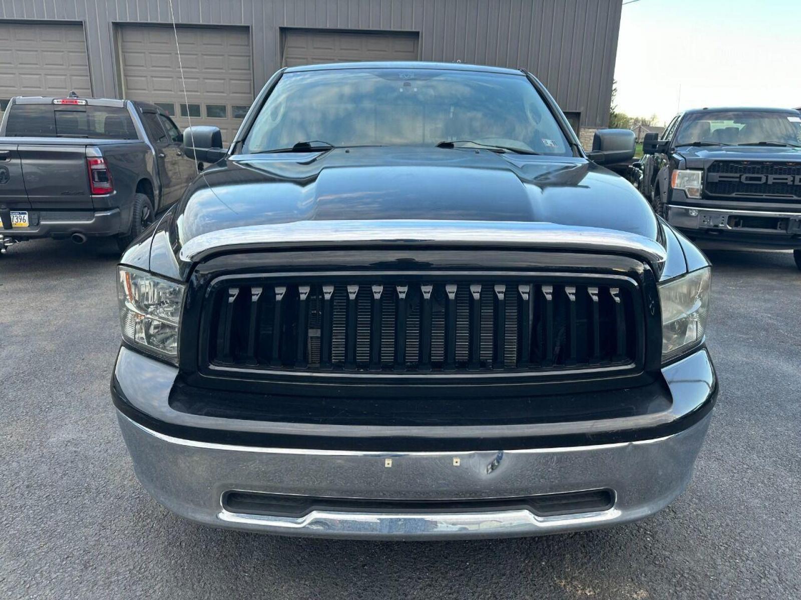 2010 Black Dodge Ram 1500 (1D7RV1GP9AS) with an 4.7L V8 4.7L V8 engine, located at 4845 Woodbury Pike, Roaring Springs, PA, (814) 317-5008, (814) 317-5008, 40.250935, -78.366959 - 2010 Dodge Ram SLT 1500, automatic, 4.7L, 227k, CD, air conditioning, power windows/locks, cruise/tilt wheel, two new tires and brake calipers on the front. Runs and drives good. Not a rusted out truck! Good shape! Truck is being sold as is. Truck has a reconstructed title due to rear bumper an - Photo #3