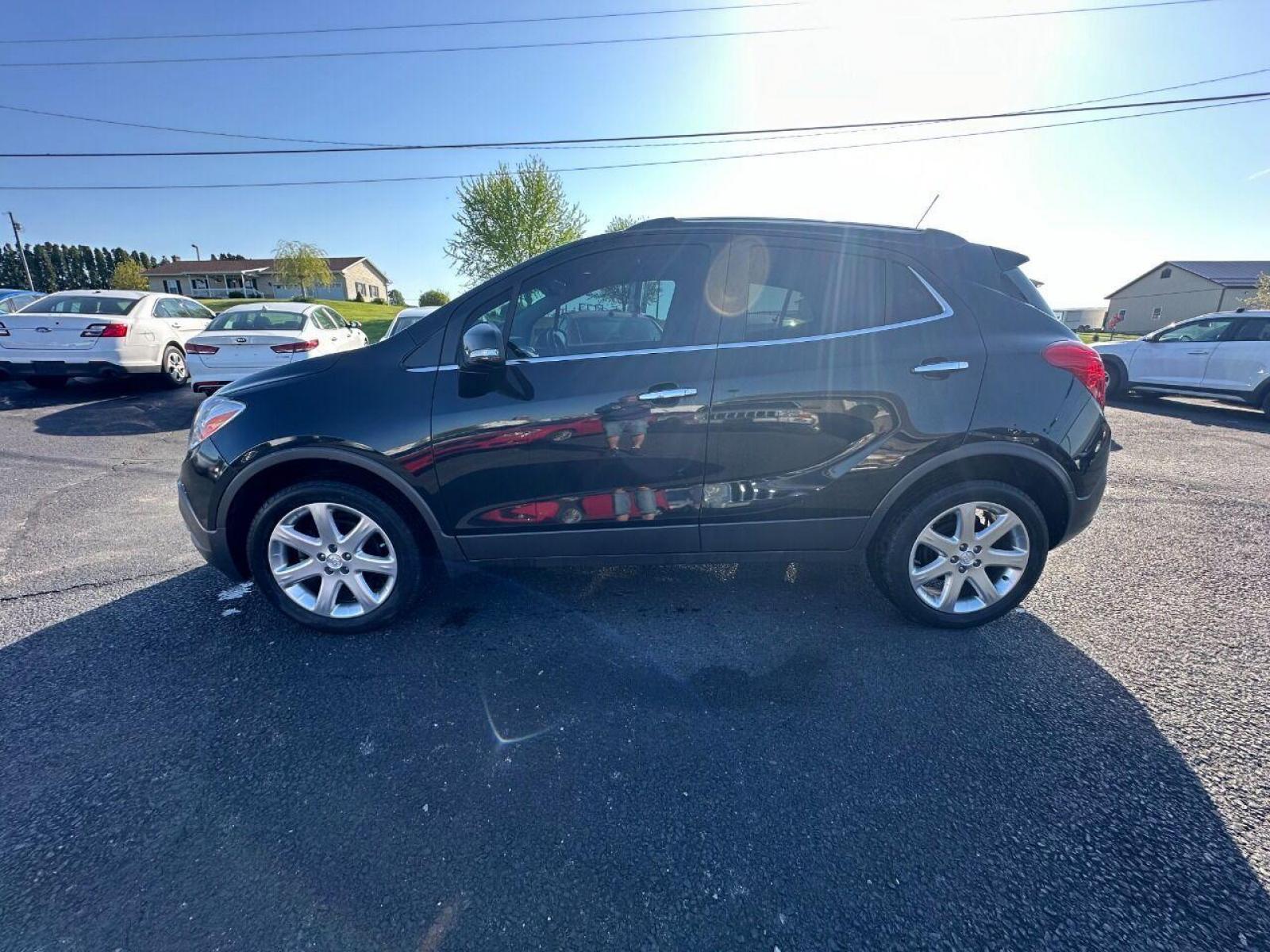 2015 Black Buick Encore (KL4CJHSB4FB) with an 1.4L I4 Turbocharger 1.4L I4 engine, located at 4845 Woodbury Pike, Roaring Springs, PA, (814) 317-5008, (814) 317-5008, 40.250935, -78.366959 - 2015 Buick Encore Premium, AWD, leather, roof, power windows/locks/seats and mirrors, rain sensing windshield, park assist, hands free phone, cruise/tilt wheel and much more. Clean! Ready to go with new inspection! Warranty available! If interested, 814-317-5008 or 814-497-4383. - Photo #0