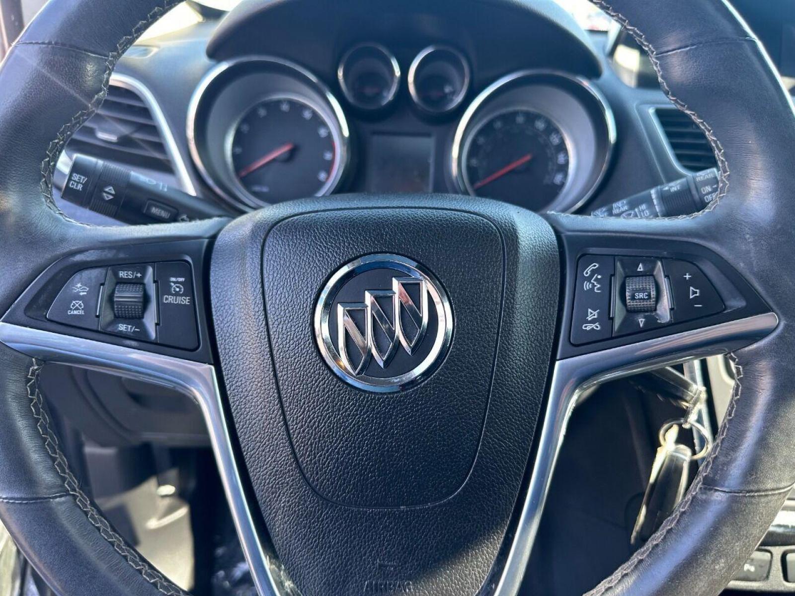 2015 Black Buick Encore (KL4CJHSB4FB) with an 1.4L I4 Turbocharger 1.4L I4 engine, located at 4845 Woodbury Pike, Roaring Springs, PA, (814) 317-5008, (814) 317-5008, 40.250935, -78.366959 - 2015 Buick Encore Premium, AWD, leather, roof, power windows/locks/seats and mirrors, rain sensing windshield, park assist, hands free phone, cruise/tilt wheel and much more. Clean! Ready to go with new inspection! Warranty available! If interested, 814-317-5008 or 814-497-4383. - Photo #14