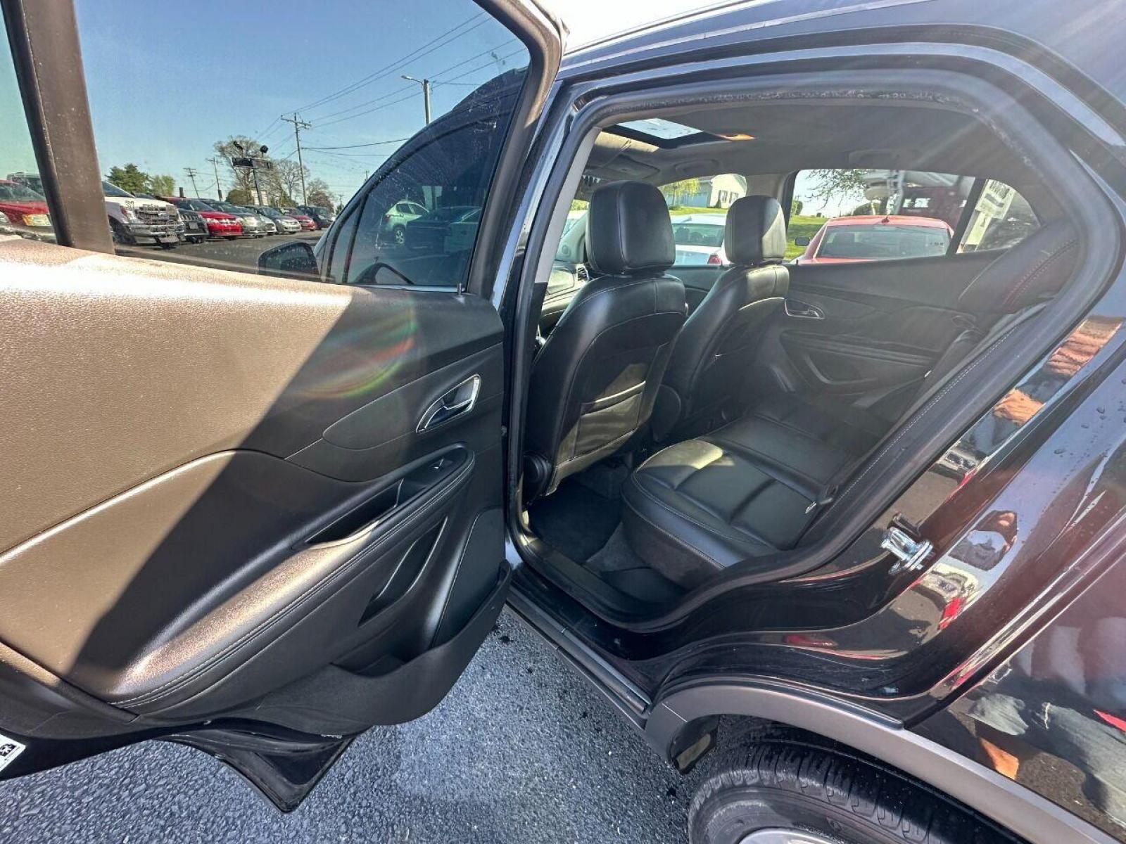 2015 Black Buick Encore (KL4CJHSB4FB) with an 1.4L I4 Turbocharger 1.4L I4 engine, located at 4845 Woodbury Pike, Roaring Springs, PA, (814) 317-5008, (814) 317-5008, 40.250935, -78.366959 - 2015 Buick Encore Premium, AWD, leather, roof, power windows/locks/seats and mirrors, rain sensing windshield, park assist, hands free phone, cruise/tilt wheel and much more. Clean! Ready to go with new inspection! Warranty available! If interested, 814-317-5008 or 814-497-4383. - Photo #5