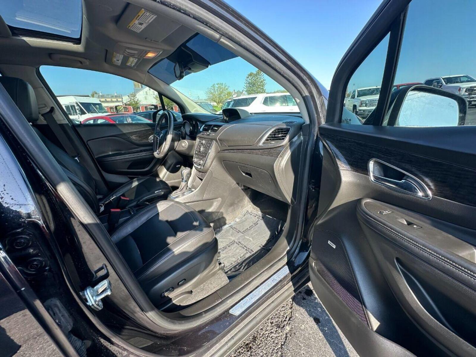 2015 Black Buick Encore (KL4CJHSB4FB) with an 1.4L I4 Turbocharger 1.4L I4 engine, located at 4845 Woodbury Pike, Roaring Springs, PA, (814) 317-5008, (814) 317-5008, 40.250935, -78.366959 - 2015 Buick Encore Premium, AWD, leather, roof, power windows/locks/seats and mirrors, rain sensing windshield, park assist, hands free phone, cruise/tilt wheel and much more. Clean! Ready to go with new inspection! Warranty available! If interested, 814-317-5008 or 814-497-4383. - Photo #6
