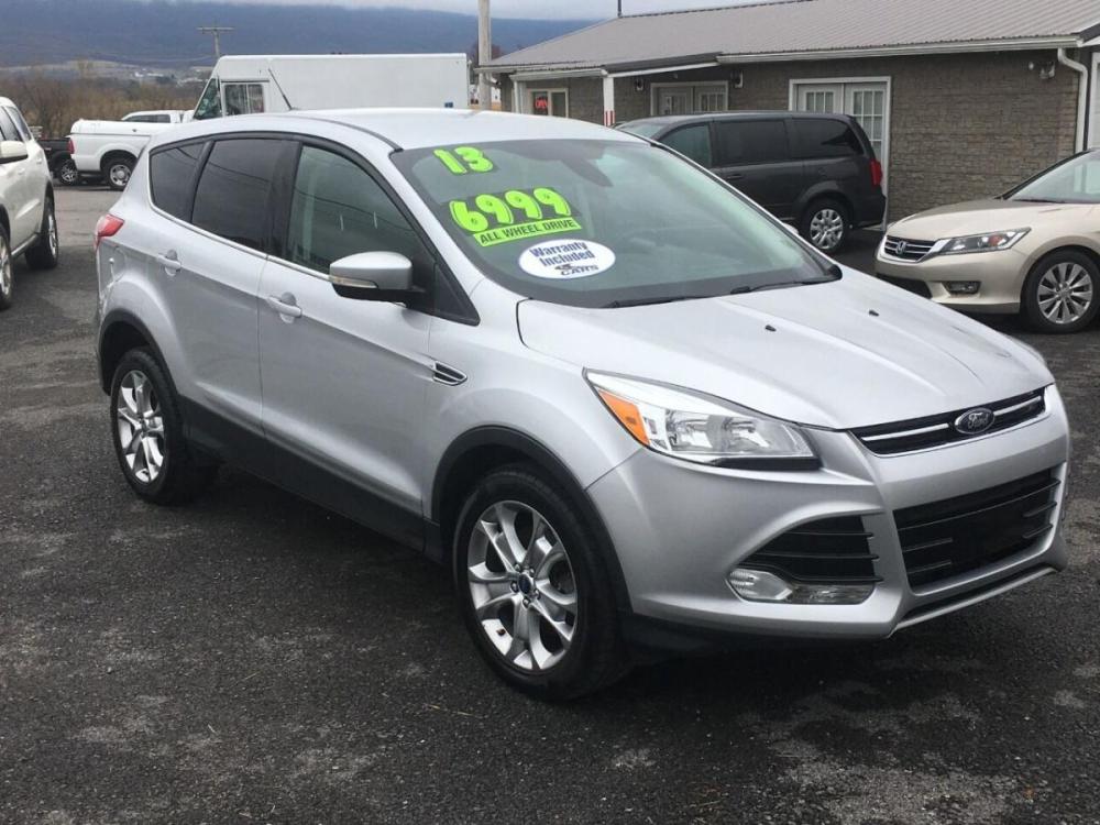 2013 Silver Ford Escape (1FMCU9H93DU) with an 2.0L I4 Turbocharger 2.0L I4 engine, located at 4845 Woodbury Pike, Roaring Springs, PA, (814) 317-5008, (814) 317-5008, 40.250935, -78.366959 - Photo #0