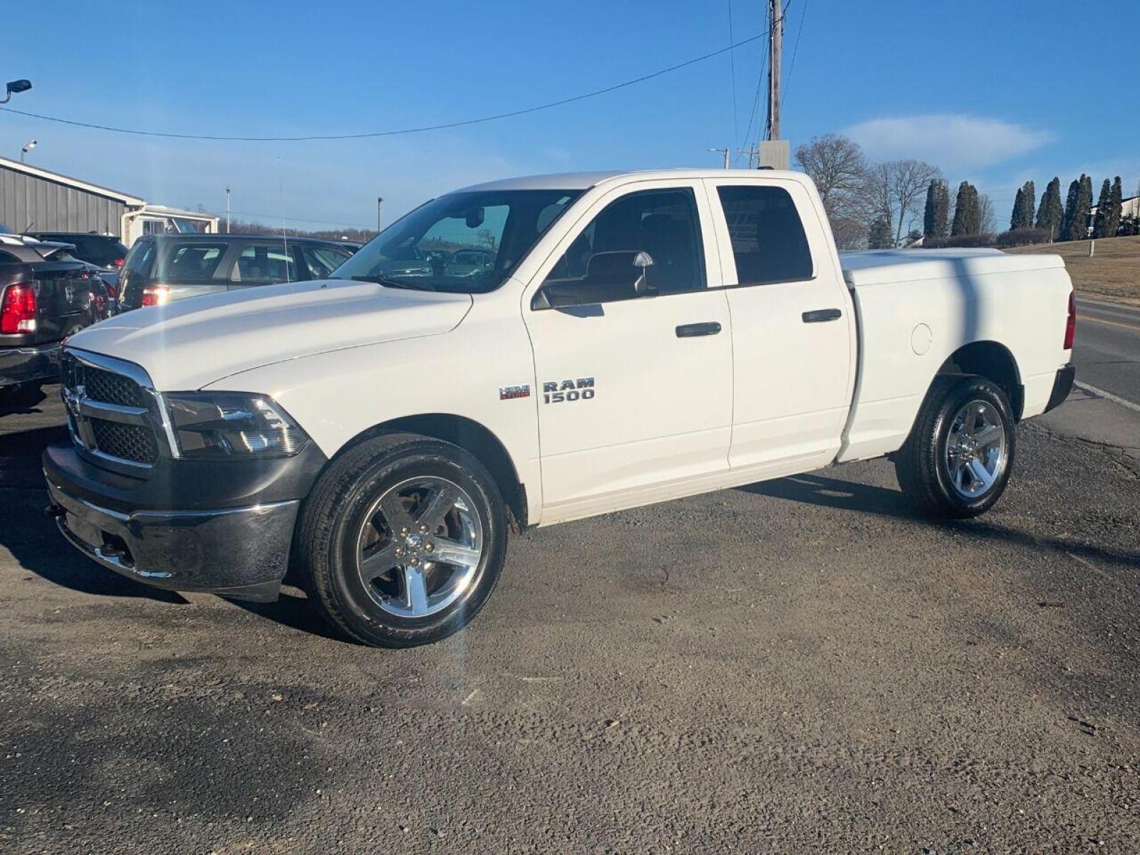 2014 White RAM 1500 (1C6RR7FT8ES) with an 5.7L V8 5.7L V8 engine, located at 4845 Woodbury Pike, Roaring Springs, PA, (814) 317-5008, (814) 317-5008, 40.250935, -78.366959 - 2014 Dodge Ram 1500, automatic, 160k, V8, 5.7 Hemi, power windows/locks, cruise/tilt wheel, air conditioning, rear back up camera, painted hard tonneau cover, 20 chrome wheels and more. Truck has new inspection, new brakes/rotors. To see a full list of this vehicles options visit smithfamilycarstor - Photo #1