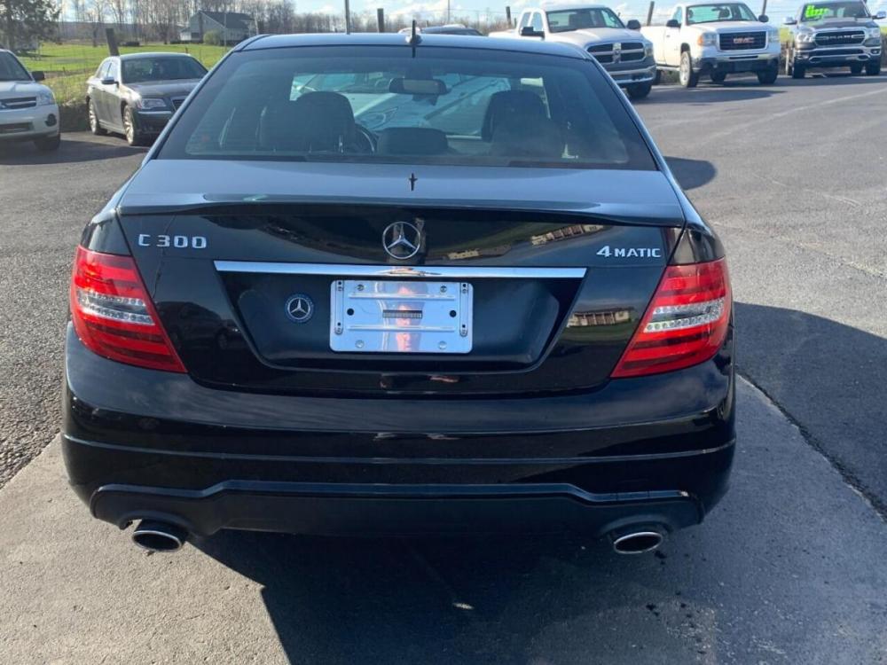 2014 Black Mercedes-Benz C-Class (WDDGF8AB3EA) with an 3.5L V6 3.5L V6 engine, located at 4845 Woodbury Pike, Roaring Springs, PA, (814) 317-5008, (814) 317-5008, 40.250935, -78.366959 - Photo #7