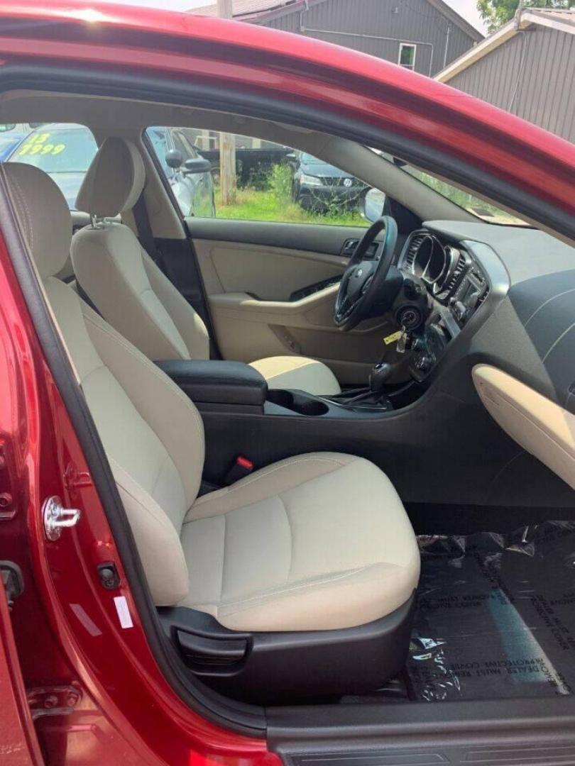 2013 Burgundy Kia Optima (5XXGM4A78DG) with an 2.4L I4 2.4L I4 engine, located at 4845 Woodbury Pike, Roaring Springs, PA, (814) 317-5008, (814) 317-5008, 40.250935, -78.366959 - 2013 Kia Optima, automatic, 80k original miles, power windows/locks, cruise/tilt wheel, air conditioning and more. Vehicle is being sold cheaper due to having a Reconstructed title from damage on rear deck lid and rear bumper cover. No paint work was done. The same color parts were bolted on. Cl - Photo#7