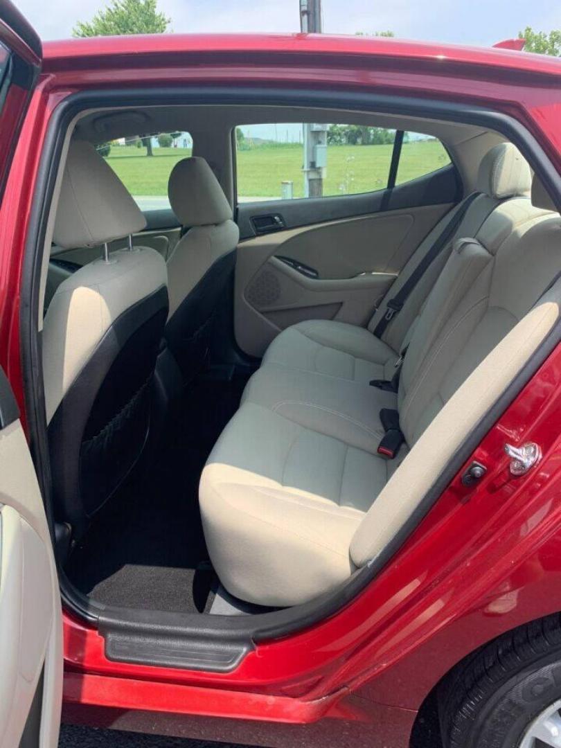 2013 Burgundy Kia Optima (5XXGM4A78DG) with an 2.4L I4 2.4L I4 engine, located at 4845 Woodbury Pike, Roaring Springs, PA, (814) 317-5008, (814) 317-5008, 40.250935, -78.366959 - 2013 Kia Optima, automatic, 80k original miles, power windows/locks, cruise/tilt wheel, air conditioning and more. Vehicle is being sold cheaper due to having a Reconstructed title from damage on rear deck lid and rear bumper cover. No paint work was done. The same color parts were bolted on. Cl - Photo#11