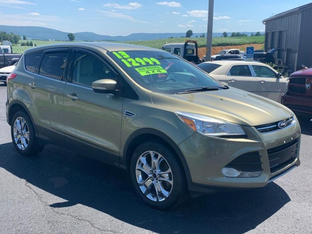 2013 Other Ford Escape (1FMCU9HXXDU) with an 1.6L I4 Turbocharger 1.6L I4 engine, located at 4845 Woodbury Pike, Roaring Springs, PA, (814) 317-5008, (814) 317-5008, 40.250935, -78.366959 - 2013 Ford Escape SEL, automatic, 4x4, 92k, CD, Navigation, big screen radio plus much more. Excellent fuel mileage! Clean car! Will come with a 3 month/4500 mile power train waranty with the option to upgrade. To see a full list of this vehicles options visit smithfamilycarstore.com. If interes - Photo #0
