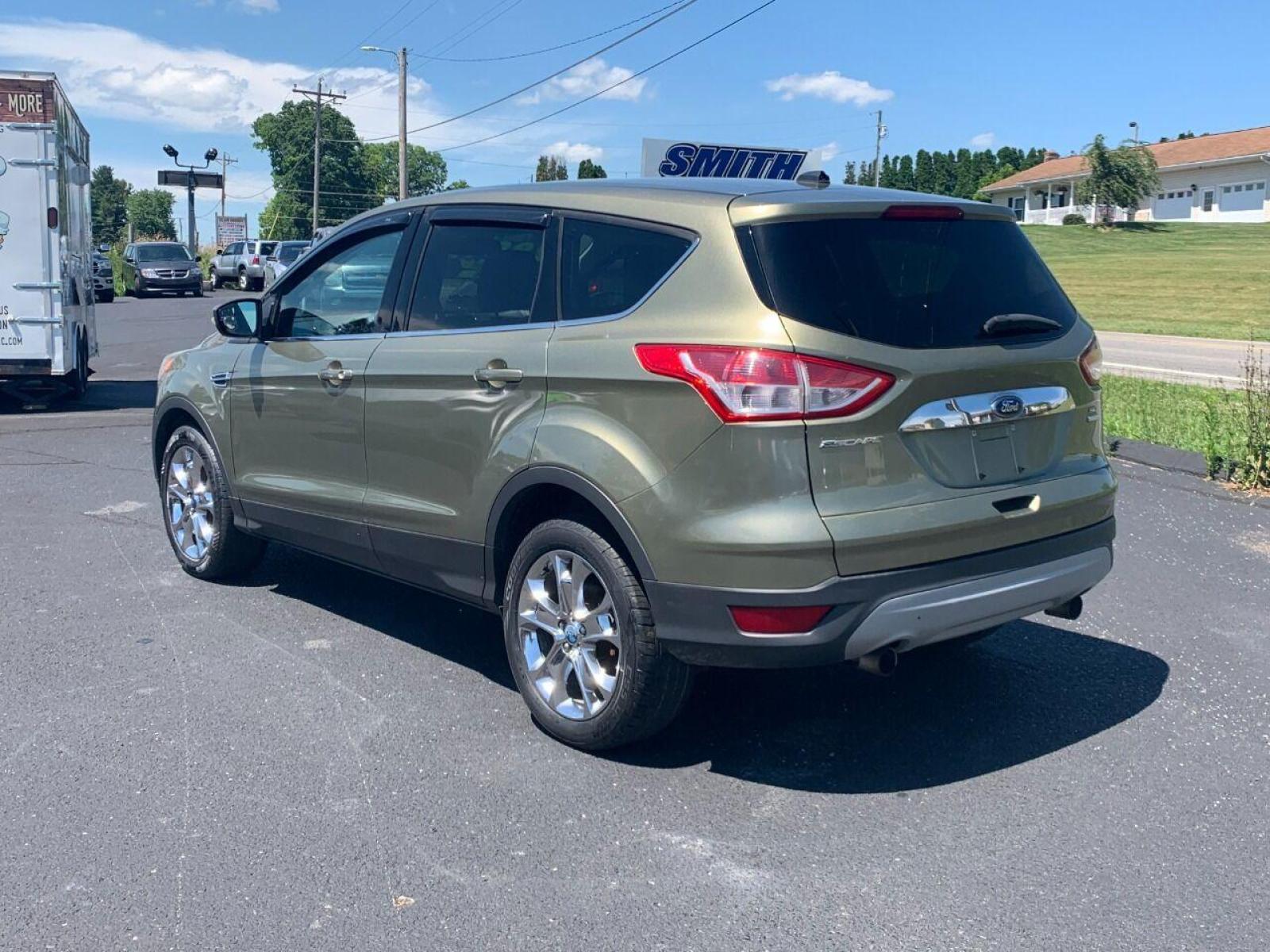 2013 Other Ford Escape (1FMCU9HXXDU) with an 1.6L I4 Turbocharger 1.6L I4 engine, located at 4845 Woodbury Pike, Roaring Springs, PA, (814) 317-5008, (814) 317-5008, 40.250935, -78.366959 - Photo #2