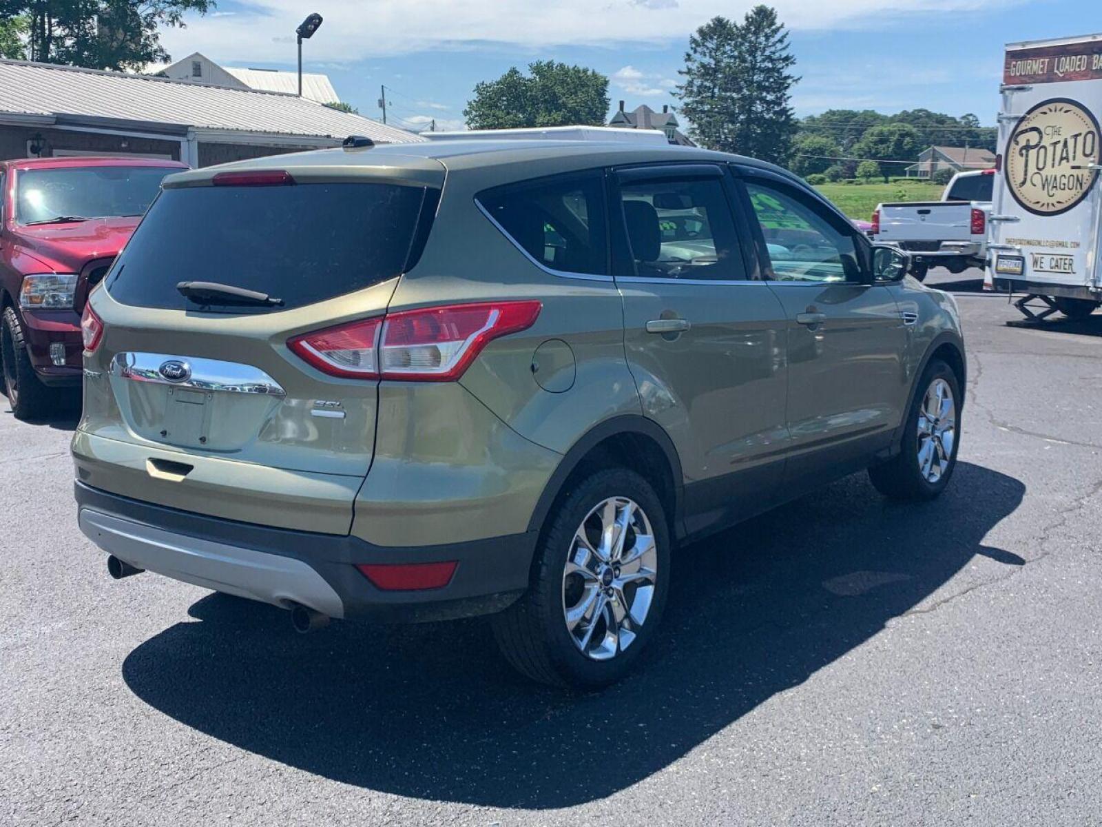 2013 Other Ford Escape (1FMCU9HXXDU) with an 1.6L I4 Turbocharger 1.6L I4 engine, located at 4845 Woodbury Pike, Roaring Springs, PA, (814) 317-5008, (814) 317-5008, 40.250935, -78.366959 - Photo #3