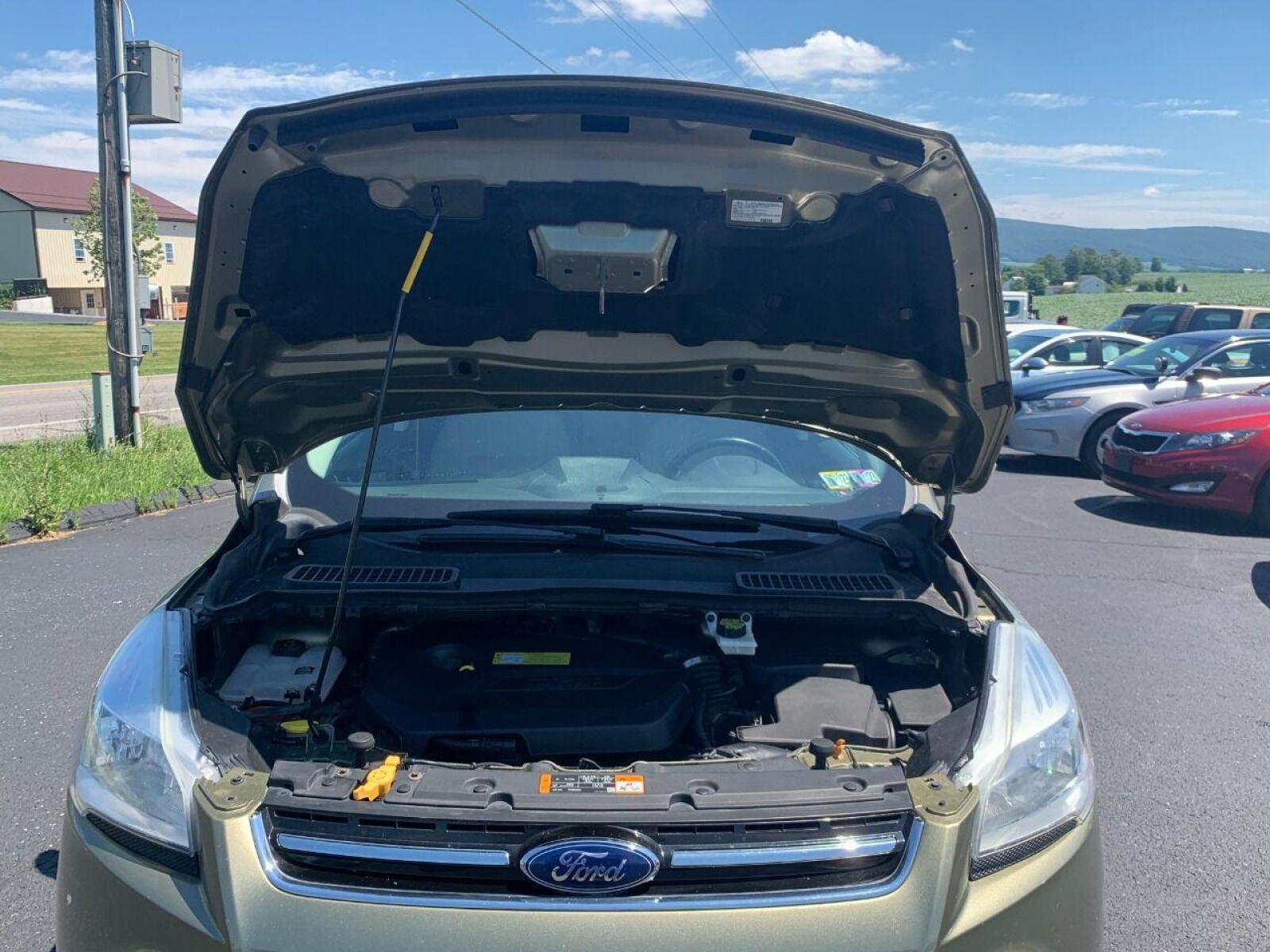 2013 Other Ford Escape (1FMCU9HXXDU) with an 1.6L I4 Turbocharger 1.6L I4 engine, located at 4845 Woodbury Pike, Roaring Springs, PA, (814) 317-5008, (814) 317-5008, 40.250935, -78.366959 - Photo #4