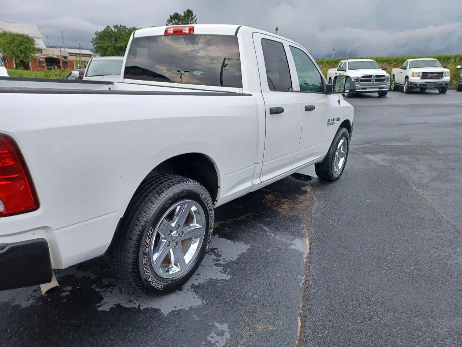 2014 White RAM 1500 (1C6RR7FTXES) with an 5.7L V8 5.7L V8 engine, located at 4845 Woodbury Pike, Roaring Springs, PA, (814) 317-5008, (814) 317-5008, 40.250935, -78.366959 - Photo #3