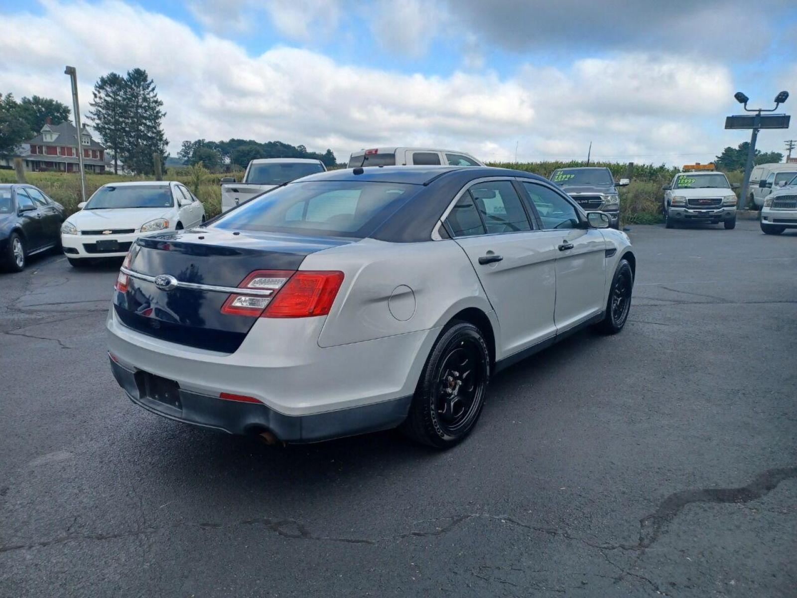 2014 Other Ford Taurus (1FAHP2MK4EG) with an 3.7L V6 3.7L V6 engine, located at 4845 Woodbury Pike, Roaring Springs, PA, (814) 317-5008, (814) 317-5008, 40.250935, -78.366959 - Photo #3