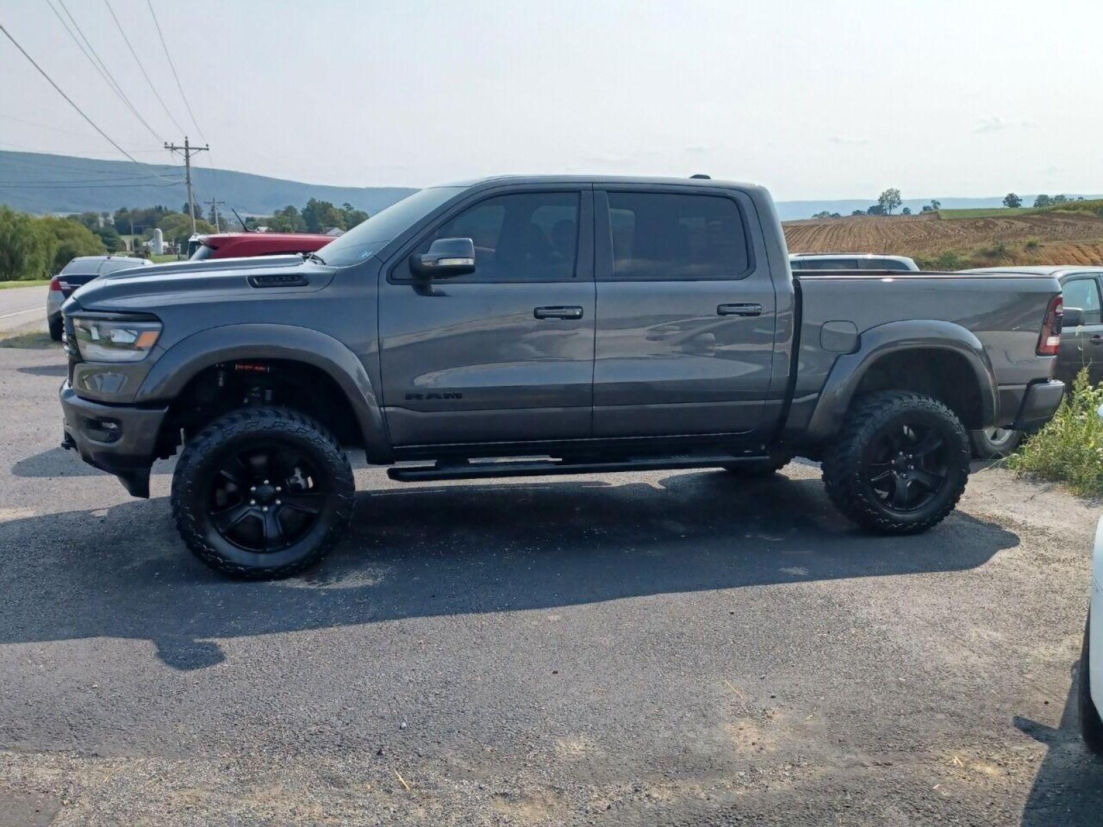 2020 Gray RAM 1500 (1C6SRFFT4LN) with an 5.7L V8 5.7L V8 engine, located at 4845 Woodbury Pike, Roaring Springs, PA, (814) 317-5008, (814) 317-5008, 40.250935, -78.366959 - 2020 Ram Bighorn 1500, 14k, automatic, Must see condition! This truck was over $75k to build. Suspension was over $10k and is all Fox and BDS. To many options to list! Truck has panoramic roof, blind spot, auto breaking, led lights, 12 radio, Alpine sound system, back up, Navigation. Truck looks - Photo #4