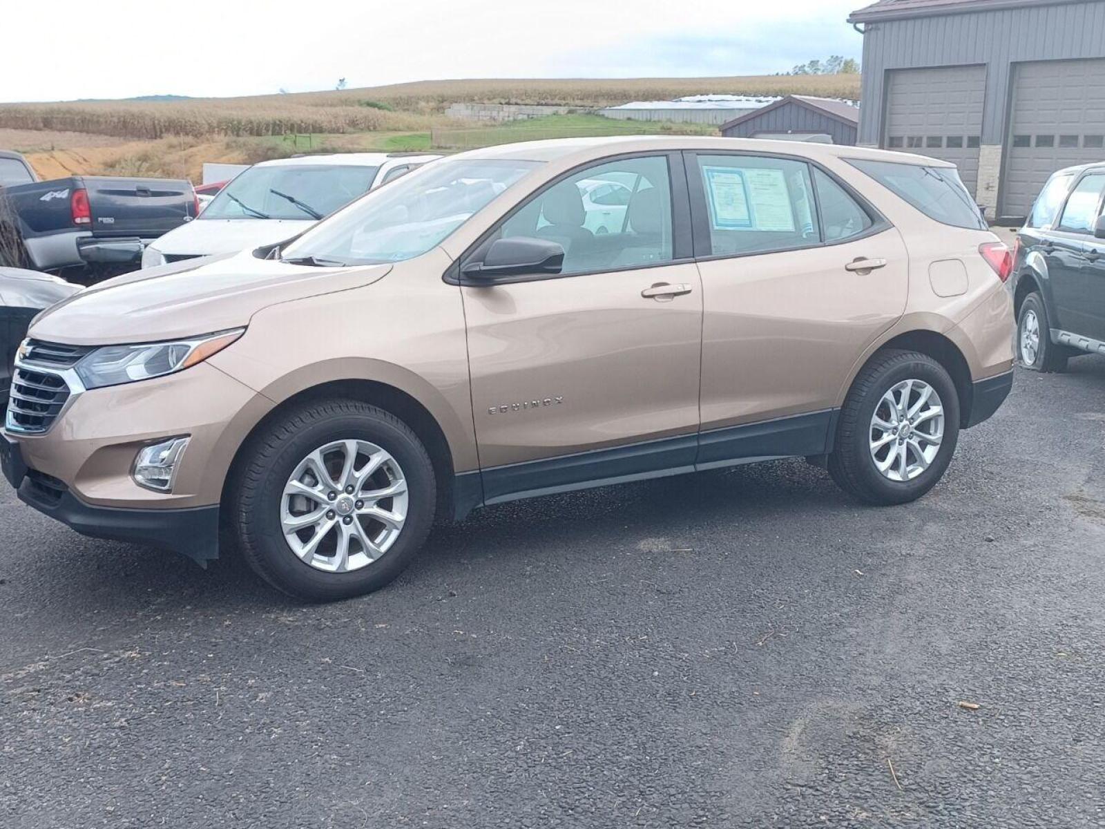 2018 Champagne Chevrolet Equinox (2GNAXREV5J6) with an 1.5L I4 Turbocharger 1.5L I4 engine, located at 4845 Woodbury Pike, Roaring Springs, PA, (814) 317-5008, (814) 317-5008, 40.250935, -78.366959 - Photo #2
