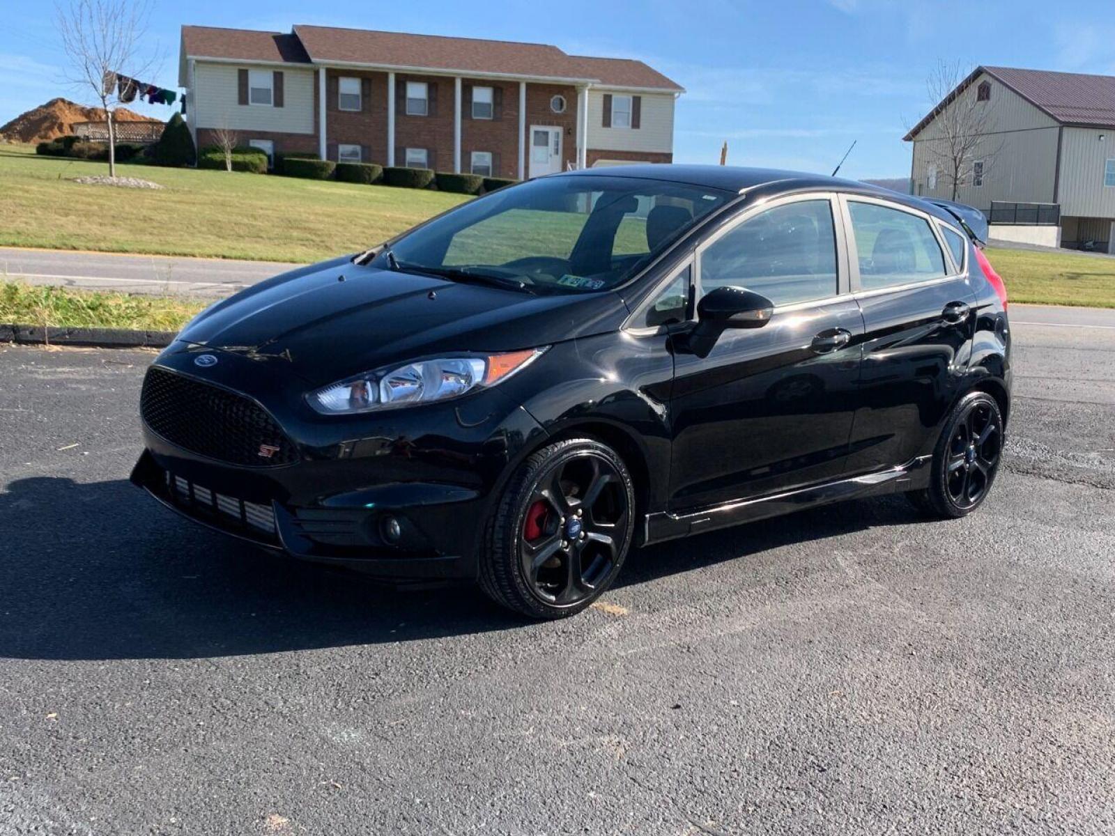 2018 Black Ford Fiesta (3FADP4GX2JM) with an 1.6L I4 Turbocharger 1.6L I4 engine, located at 4845 Woodbury Pike, Roaring Springs, PA, (814) 317-5008, (814) 317-5008, 40.250935, -78.366959 - Photo #0