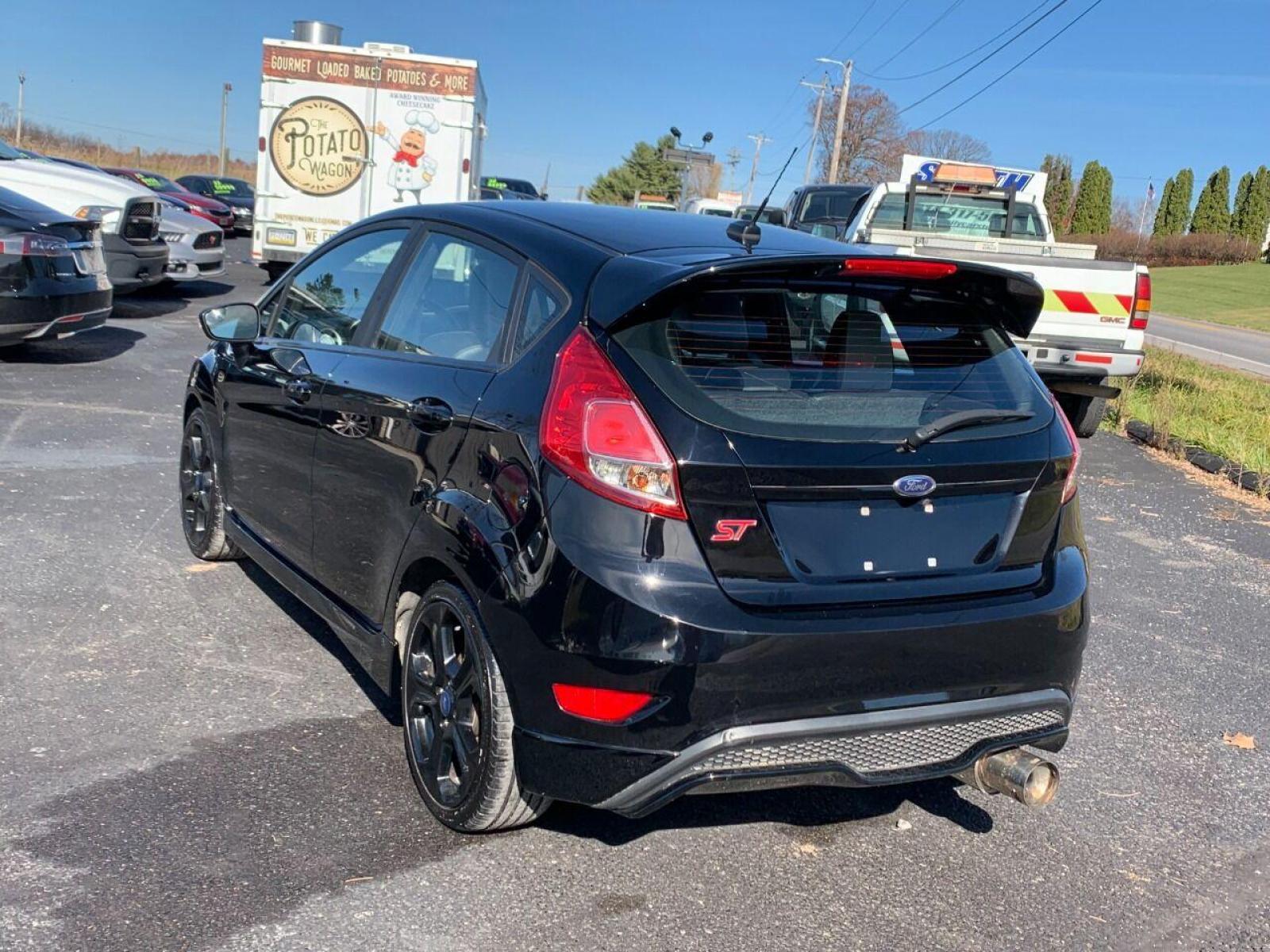 2018 Black Ford Fiesta (3FADP4GX2JM) with an 1.6L I4 Turbocharger 1.6L I4 engine, located at 4845 Woodbury Pike, Roaring Springs, PA, (814) 317-5008, (814) 317-5008, 40.250935, -78.366959 - Photo #2