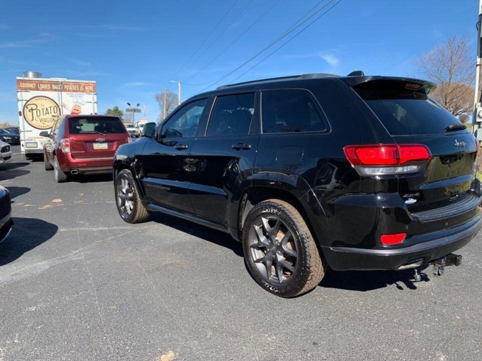 2019 Black Jeep Grand Cherokee (1C4RJFBG0KC) with an 3.6L V6 3.6L V6 engine, located at 4845 Woodbury Pike, Roaring Springs, PA, (814) 317-5008, (814) 317-5008, 40.250935, -78.366959 - Photo #4