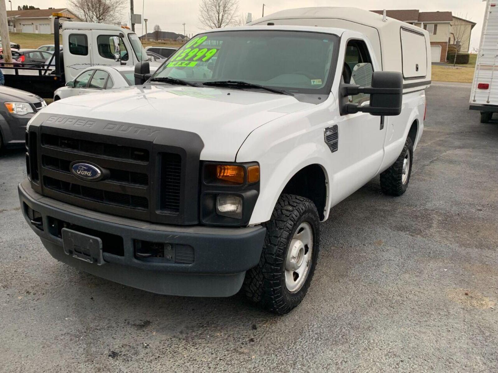 2009 White Ford F-250 Super Duty (1FTNF21539E) with an 5.4L V8 5.4L V8 engine, located at 4845 Woodbury Pike, Roaring Springs, PA, (814) 317-5008, (814) 317-5008, 40.250935, -78.366959 - 2009 Ford F250, automatic, 4x4, V8, 8 foot bed with lighted bedcap, like new tires, 166k, 1 owner. Truck was government owned, highly maintained. Rust Free Southern truck! Truck is in MUST SEE condition! Will come with a 3 month/4500 mile power train warranty with the option to upgrade. To see a - Photo #1