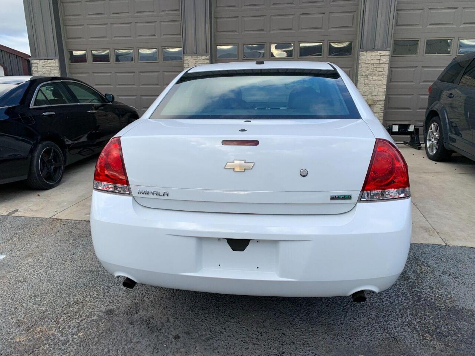 2013 White Chevrolet Impala (2G1WD5E30D1) with an 3.6L V6 3.6L V6 engine, located at 4845 Woodbury Pike, Roaring Springs, PA, (814) 317-5008, (814) 317-5008, 40.250935, -78.366959 - 2013 Chevy Impala, 3.6L, V6, FWD, automatic, 142k, highly maintained, like new tires, new inspection and more. Southern vehicle not rusty! 1 owner! Flex Fuel! Government owned! Must see condition! To see a full list of this vehicles options visit smithfamilycarstore.com. If interested, plea - Photo #2
