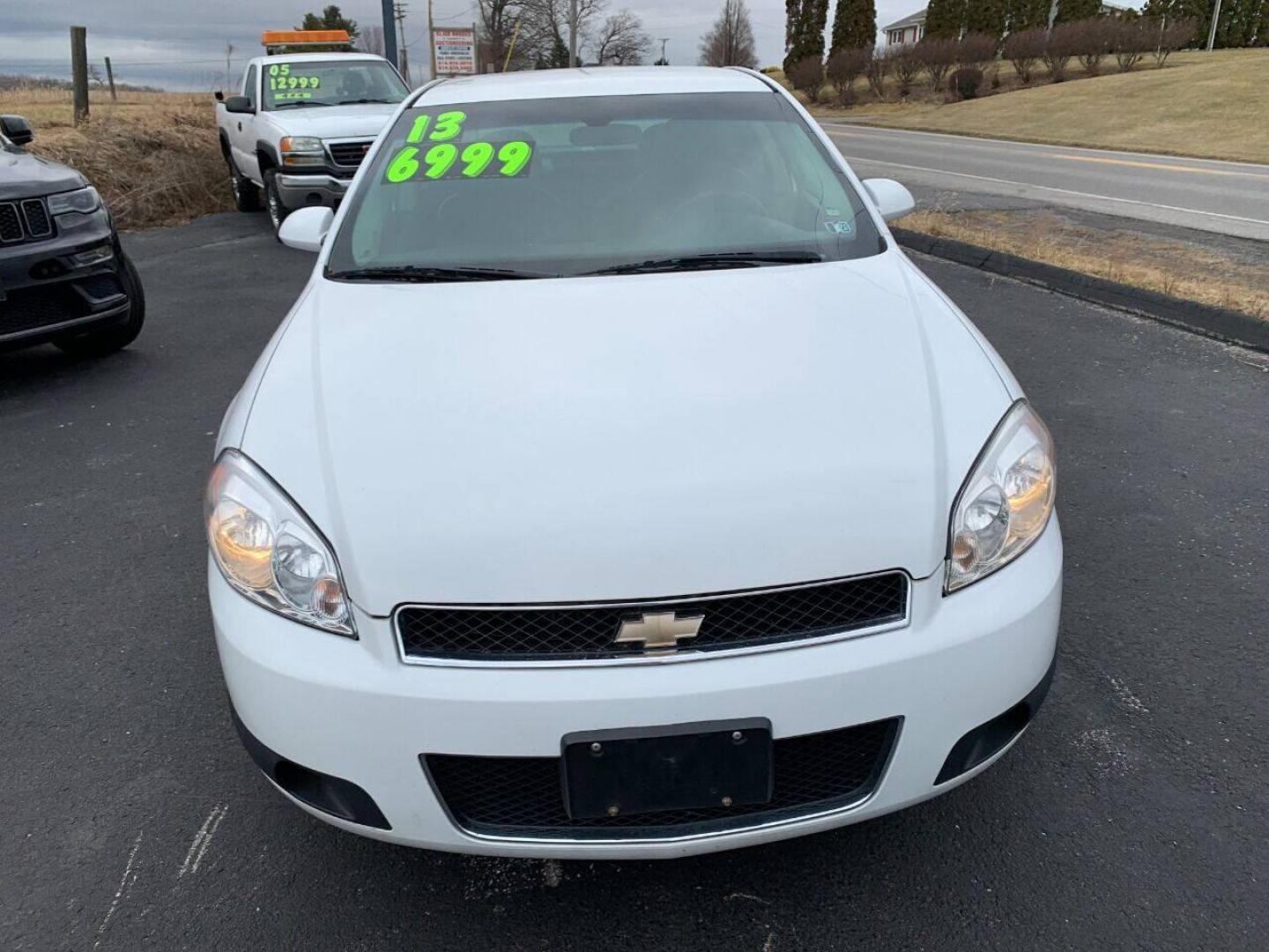2013 White Chevrolet Impala (2G1WD5E30D1) with an 3.6L V6 3.6L V6 engine, located at 4845 Woodbury Pike, Roaring Springs, PA, (814) 317-5008, (814) 317-5008, 40.250935, -78.366959 - 2013 Chevy Impala, 3.6L, V6, FWD, automatic, 142k, highly maintained, like new tires, new inspection and more. Southern vehicle not rusty! 1 owner! Flex Fuel! Government owned! Must see condition! To see a full list of this vehicles options visit smithfamilycarstore.com. If interested, plea - Photo#0