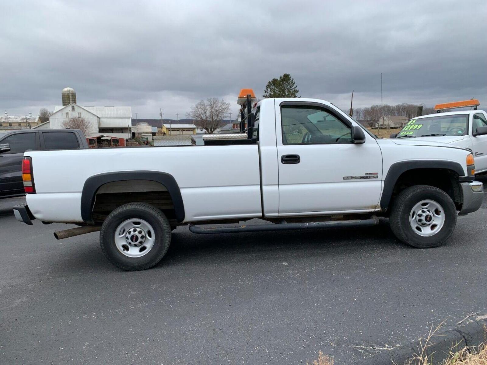2005 White GMC Sierra 2500HD (1GTHC24265E) with an 6.6L V8 Turbocharger 6.6L V8 engine, located at 4845 Woodbury Pike, Roaring Springs, PA, (814) 317-5008, (814) 317-5008, 40.250935, -78.366959 - 1 owner, Virginia State owned! Very well maintained! 2005 Chevy Sierra 2500 HD, 6.6 Diesel, automatic, 4x2, like new tires, new inspection, warranty available, vinyl, 183k, RWD, comes with 2 toolboxes. No rust repair was ever done to this truck! Rust free undercarriage! Must see condition! To se - Photo #7