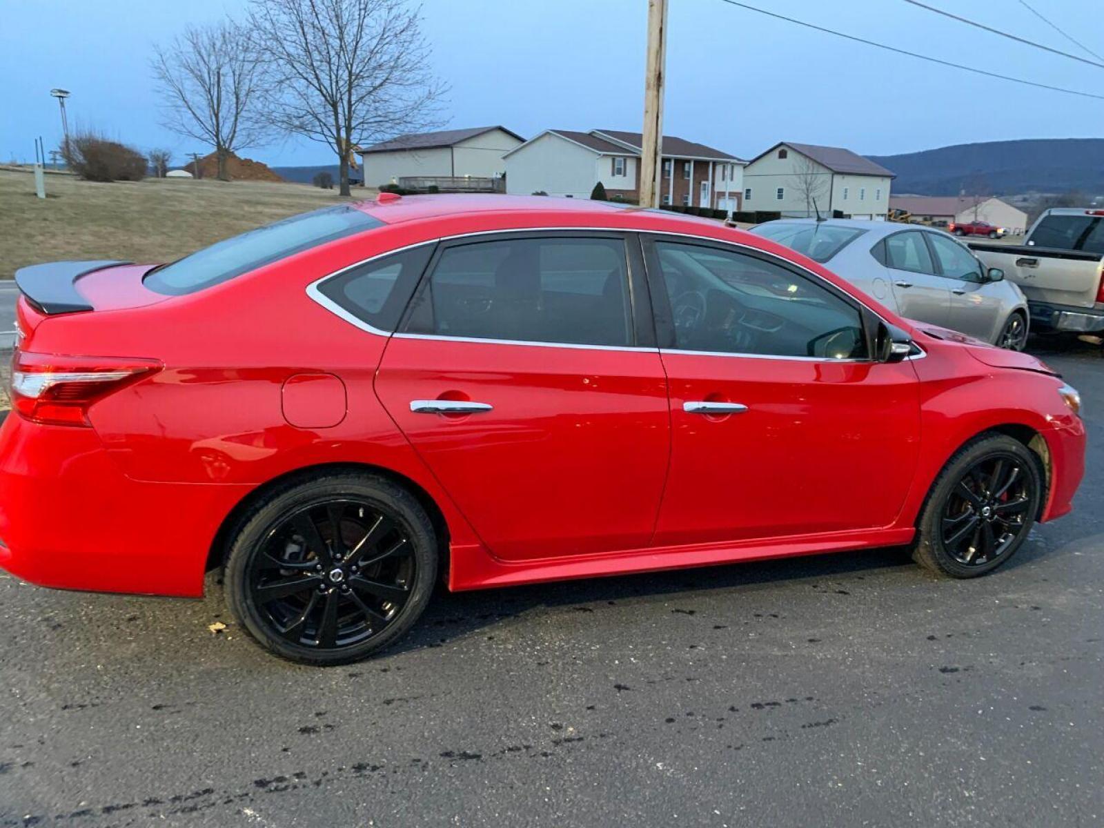 2017 Red Nissan Sentra (3N1CB7AP7HY) with an 1.6L I4 Turbocharger 1.6L I4 engine, located at 4845 Woodbury Pike, Roaring Springs, PA, (814) 317-5008, (814) 317-5008, 40.250935, -78.366959 - Photo #1