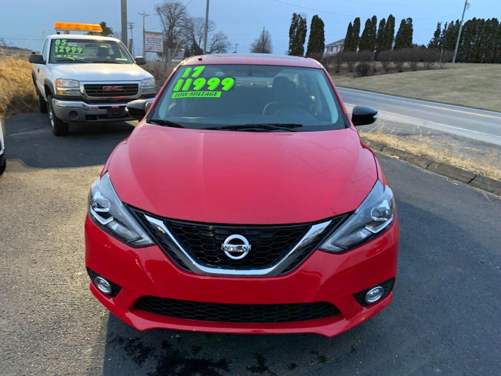 2017 Red Nissan Sentra (3N1CB7AP7HY) with an 1.6L I4 Turbocharger 1.6L I4 engine, located at 4845 Woodbury Pike, Roaring Springs, PA, (814) 317-5008, (814) 317-5008, 40.250935, -78.366959 - 2017 Nissan Sentra SR, Turbo edition, 6 speed, 82k, 18 inch wheels, rear back up camera, roof and much more. Super clean! Southern vehicle! Low miles! Vehicle is in Must See Condition! New inspection! To see a full list of this vehicles options visit smithfamilycarstore.com. If interested, please ca - Photo #2