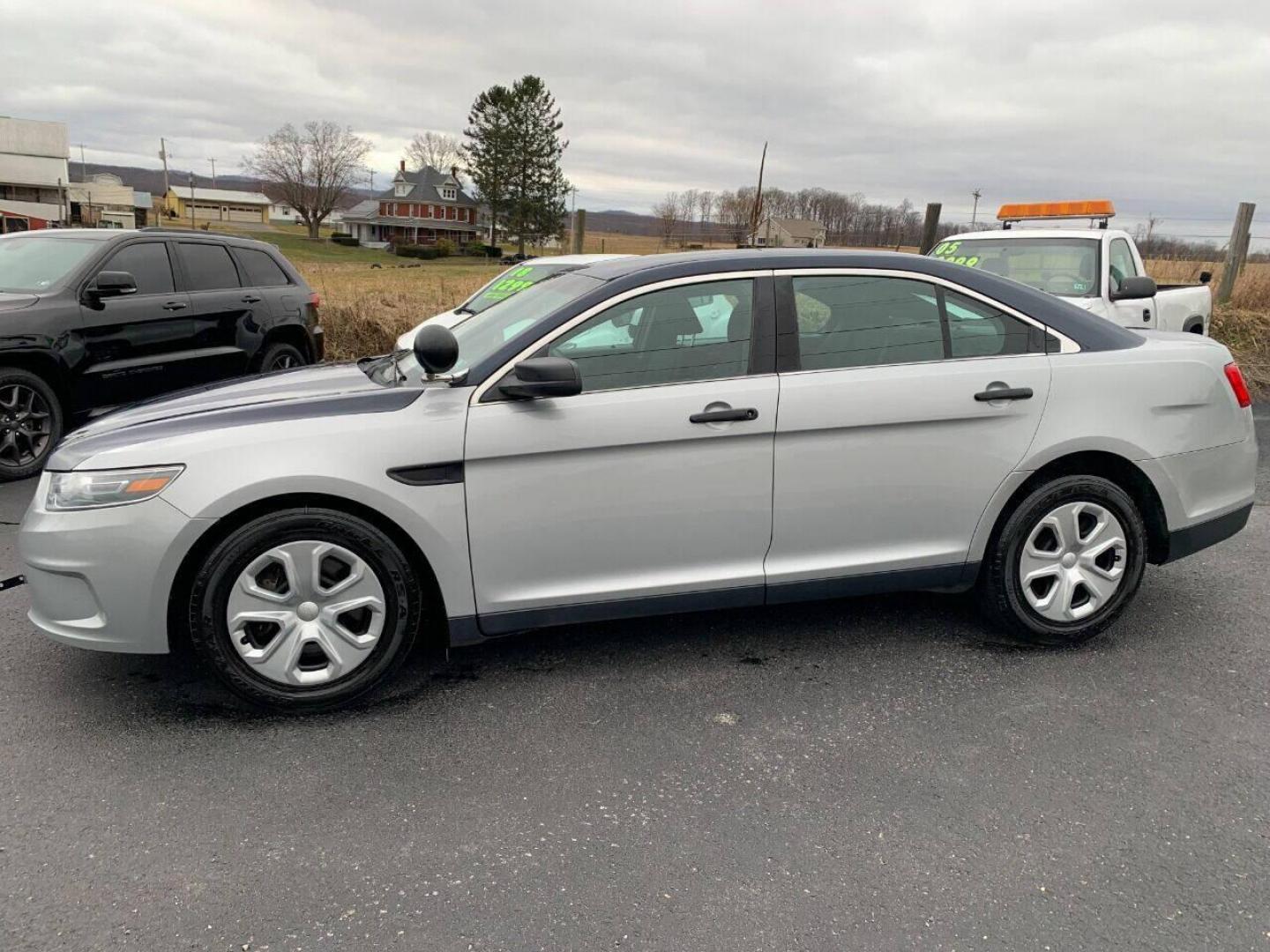 2015 Other Ford Taurus (1FAHP2MK9FG) with an 3.7L V6 3.7L V6 engine, located at 4845 Woodbury Pike, Roaring Springs, PA, (814) 317-5008, (814) 317-5008, 40.250935, -78.366959 - Photo#0