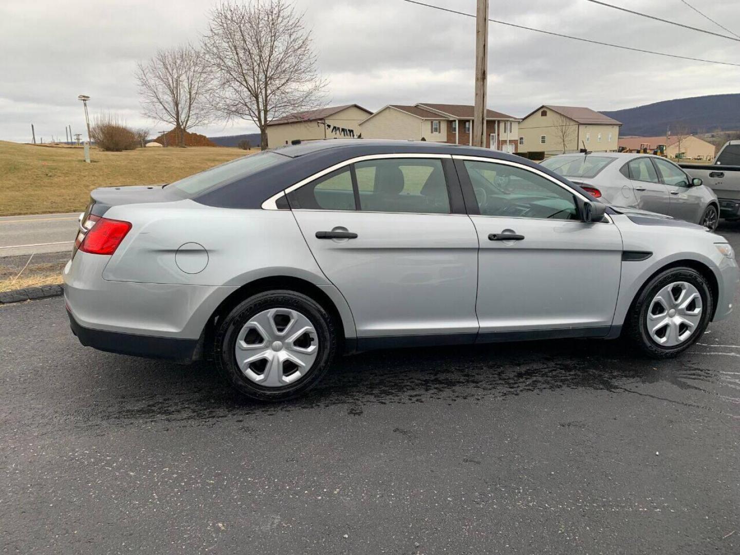 2015 Other Ford Taurus (1FAHP2MK9FG) with an 3.7L V6 3.7L V6 engine, located at 4845 Woodbury Pike, Roaring Springs, PA, (814) 317-5008, (814) 317-5008, 40.250935, -78.366959 - Photo#1