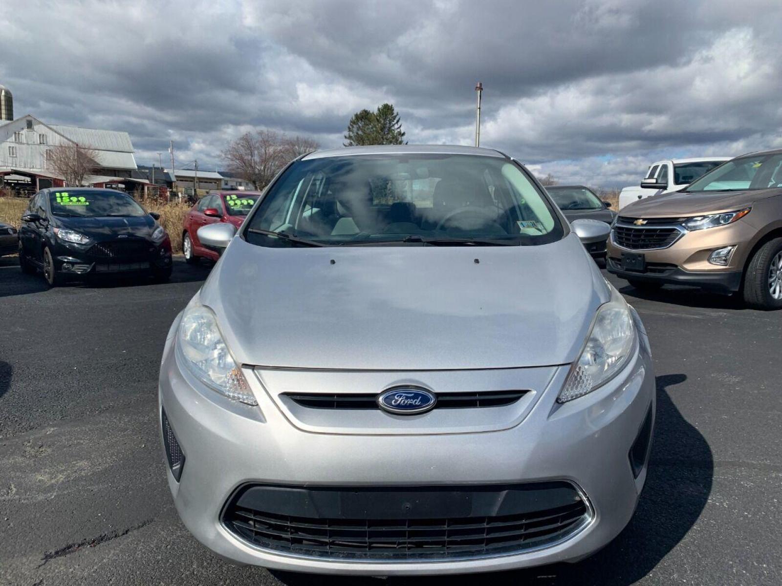 2013 Silver Ford Fiesta (3FADP4TJ3DM) with an 1.6L I4 1.6L I4 engine, located at 4845 Woodbury Pike, Roaring Springs, PA, (814) 317-5008, (814) 317-5008, 40.250935, -78.366959 - Photo #2