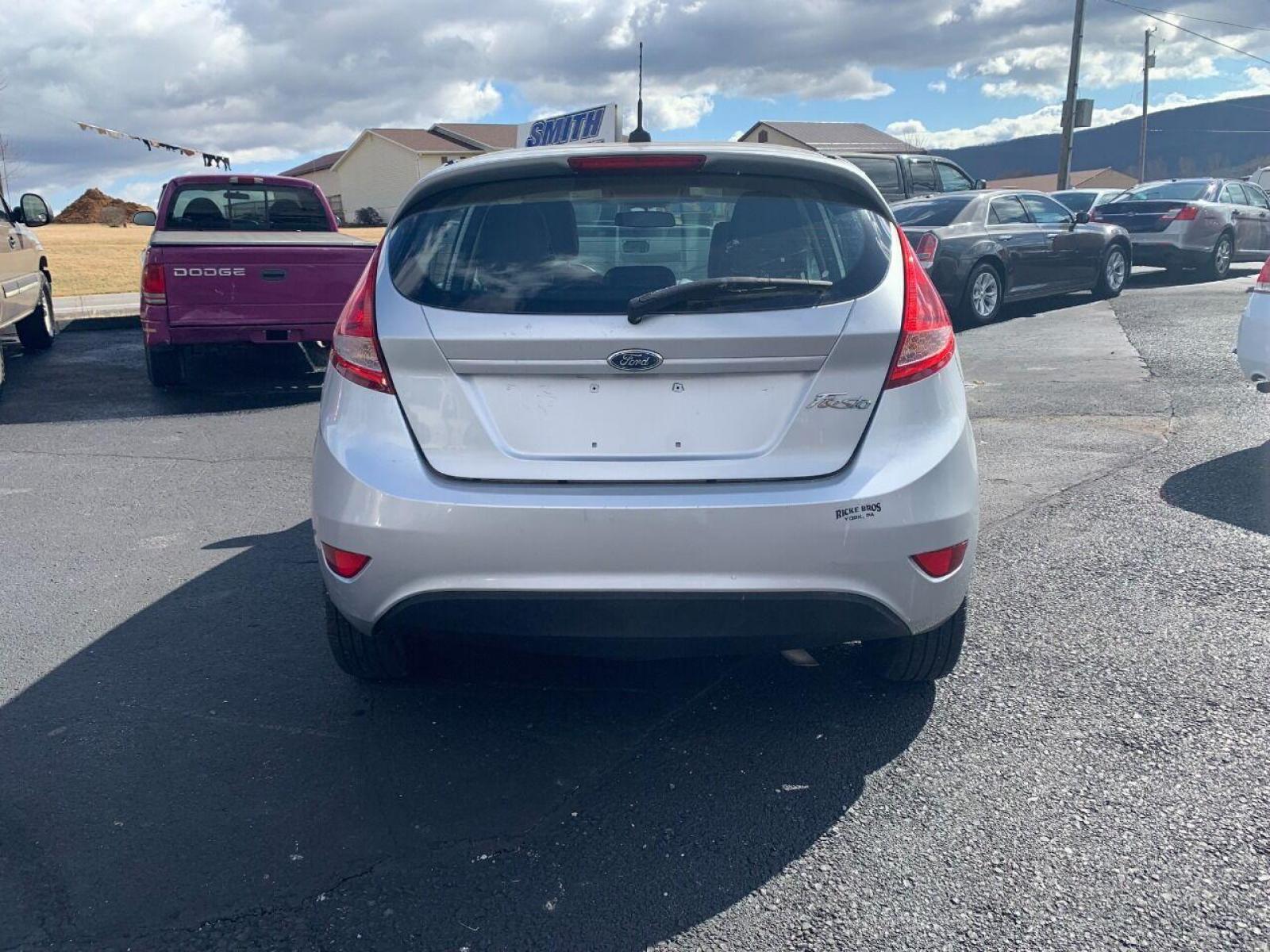 2013 Silver Ford Fiesta (3FADP4TJ3DM) with an 1.6L I4 1.6L I4 engine, located at 4845 Woodbury Pike, Roaring Springs, PA, (814) 317-5008, (814) 317-5008, 40.250935, -78.366959 - Photo #3