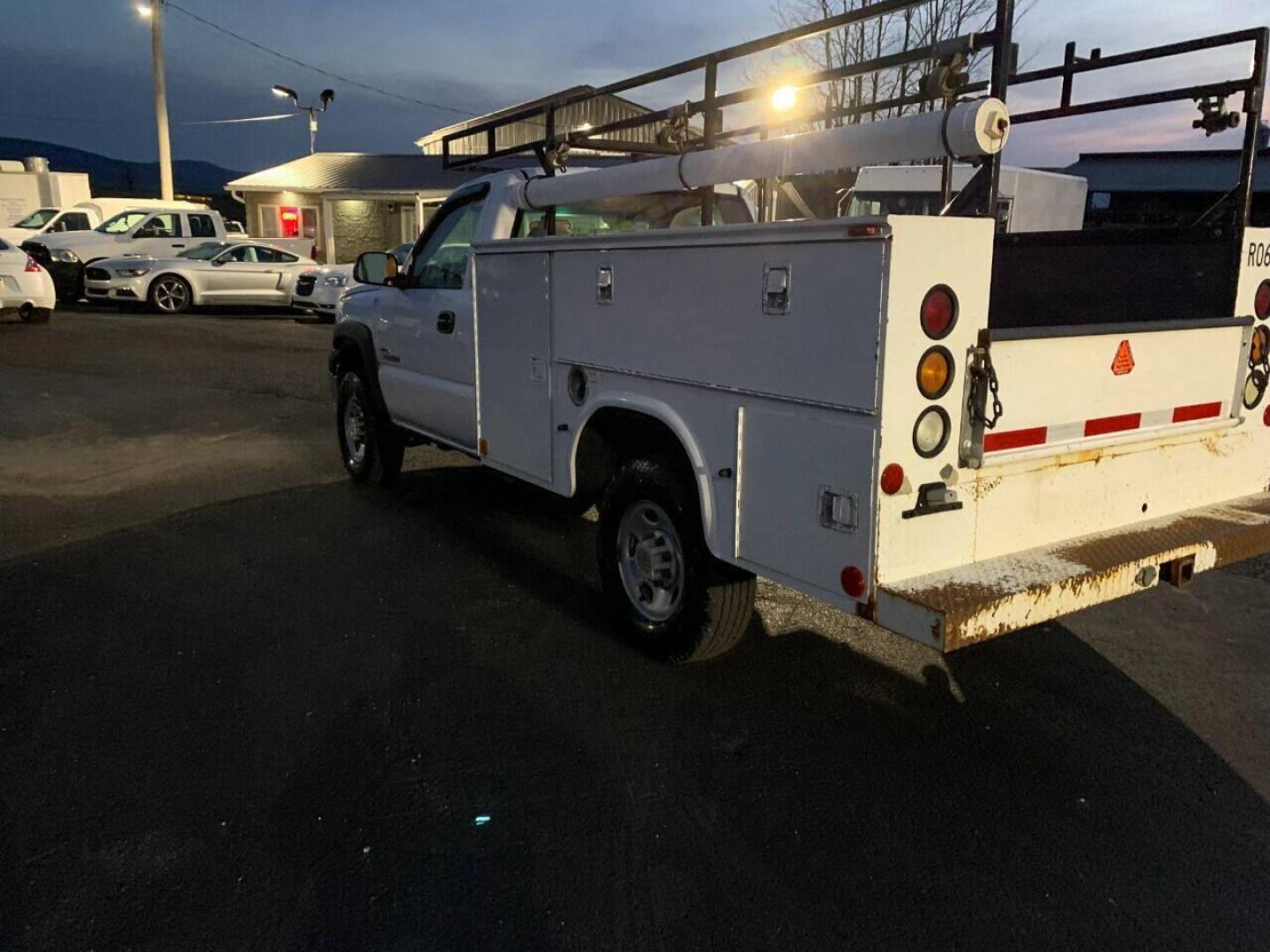 2003 White Chevrolet Silverado 2500HD (1GBHC24153E) with an 6.6L V8 Turbo 6.6L V8 engine, located at 4845 Woodbury Pike, Roaring Springs, PA, (814) 317-5008, (814) 317-5008, 40.250935, -78.366959 - 2003 Chevy 2500, 4x2, 210k, Duramax Diesel with utility bed, new inspection. Truck is a Southern vehicle. Rust free undercarriage! Everything works 100%. One owner! Must see condition. To see a full list of this vehicles options and more pictures visit smithfamilycarstore.net. If interested, p - Photo#3