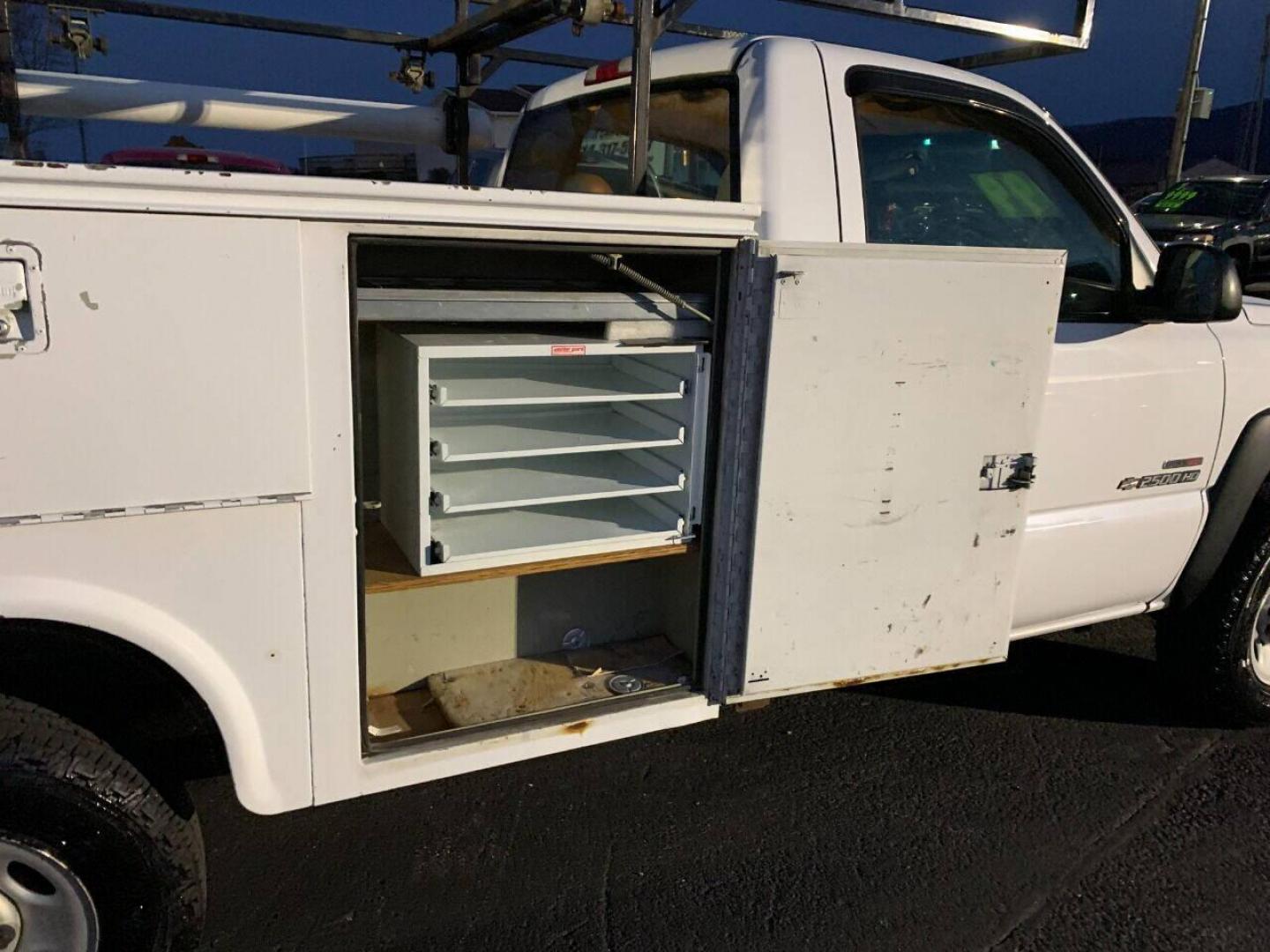 2003 White Chevrolet Silverado 2500HD (1GBHC24153E) with an 6.6L V8 Turbo 6.6L V8 engine, located at 4845 Woodbury Pike, Roaring Springs, PA, (814) 317-5008, (814) 317-5008, 40.250935, -78.366959 - 2003 Chevy 2500, 4x2, 210k, Duramax Diesel with utility bed, new inspection. Truck is a Southern vehicle. Rust free undercarriage! Everything works 100%. One owner! Must see condition. To see a full list of this vehicles options and more pictures visit smithfamilycarstore.net. If interested, p - Photo#8