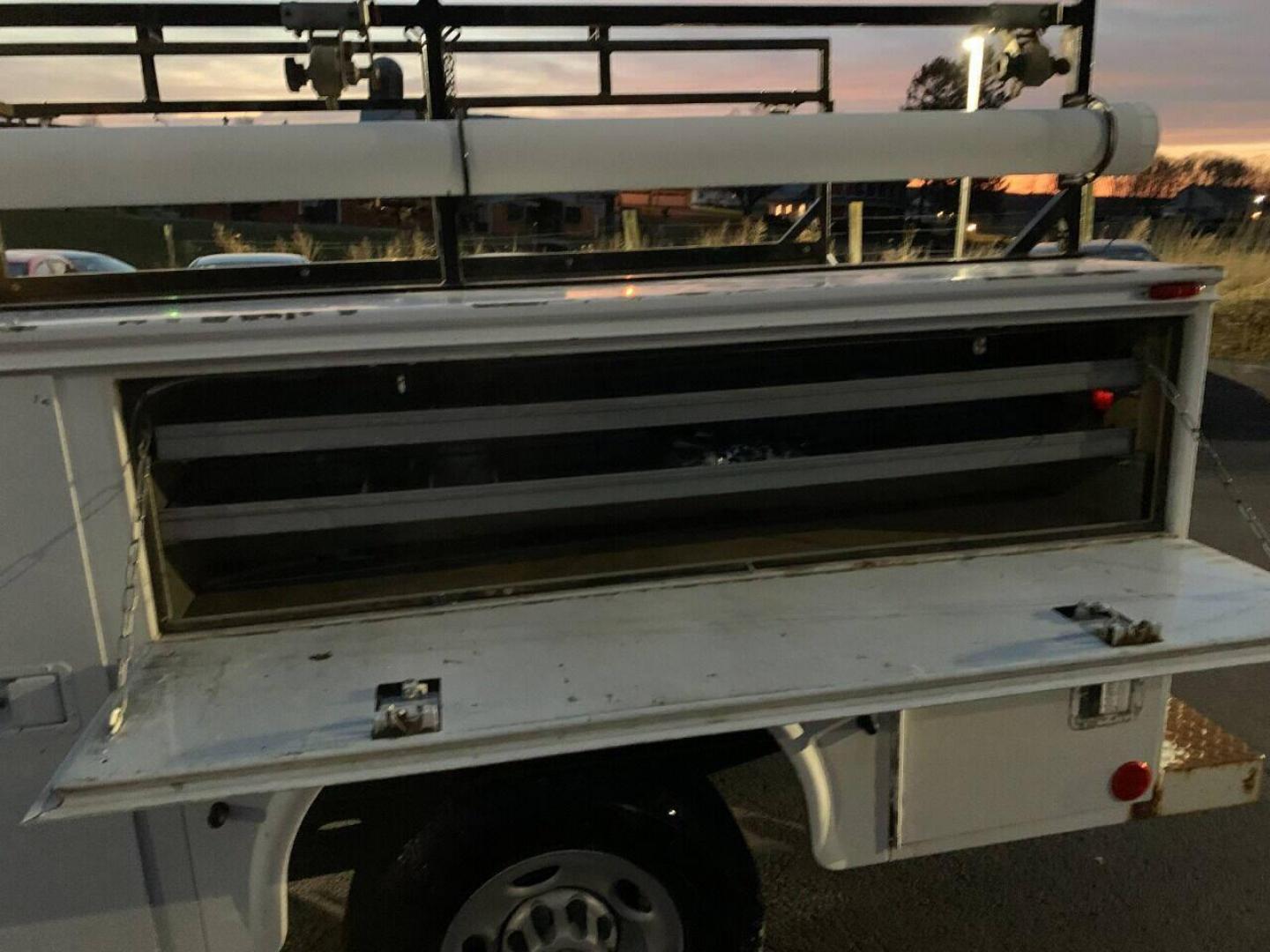 2003 White Chevrolet Silverado 2500HD (1GBHC24153E) with an 6.6L V8 Turbo 6.6L V8 engine, located at 4845 Woodbury Pike, Roaring Springs, PA, (814) 317-5008, (814) 317-5008, 40.250935, -78.366959 - 2003 Chevy 2500, 4x2, 210k, Duramax Diesel with utility bed, new inspection. Truck is a Southern vehicle. Rust free undercarriage! Everything works 100%. One owner! Must see condition. To see a full list of this vehicles options and more pictures visit smithfamilycarstore.net. If interested, p - Photo#11