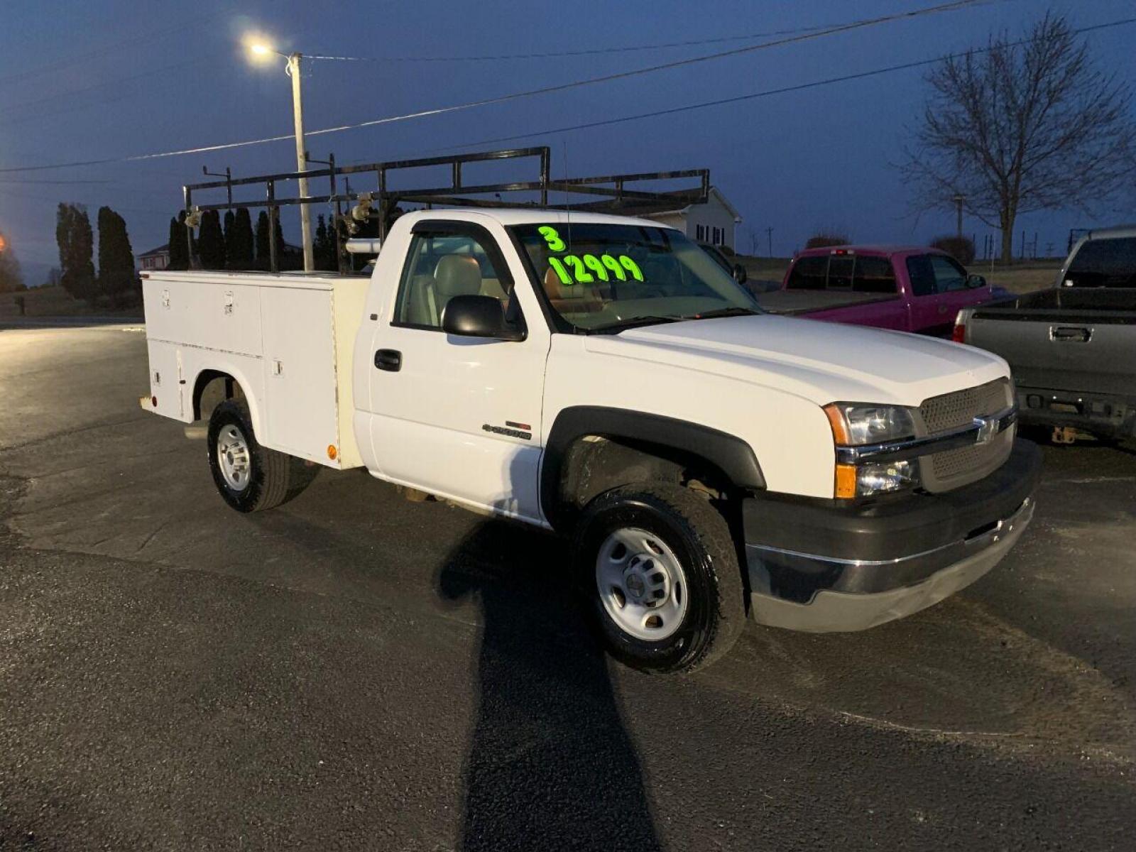 2003 White Chevrolet Silverado 2500HD (1GBHC24153E) with an 6.6L V8 Turbo 6.6L V8 engine, located at 4845 Woodbury Pike, Roaring Springs, PA, (814) 317-5008, (814) 317-5008, 40.250935, -78.366959 - 2003 Chevy 2500, 4x2, 210k, Duramax Diesel with utility bed, new inspection. Truck is a Southern vehicle. Rust free undercarriage! Everything works 100%. One owner! Must see condition. To see a full list of this vehicles options and more pictures visit smithfamilycarstore.net. If interested, p - Photo #1