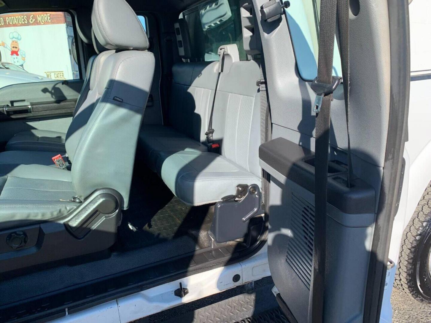 2015 White Ford F-350 Super Duty (1FT7X3B63FE) with an 6.2L V8 6.2L V8 engine, located at 4845 Woodbury Pike, Roaring Springs, PA, (814) 317-5008, (814) 317-5008, 40.250935, -78.366959 - 2015 Ford F-350, Southern Truck, Rust free, 6.2L, V8, 4x4, automatic, power windows/locks, like new tires, work cap and more. Good condition! Rust free undercarriage. Truck has extremely high miles was company owned and severely maintained! Runs great! All maintenance was done. To see a full l - Photo#6