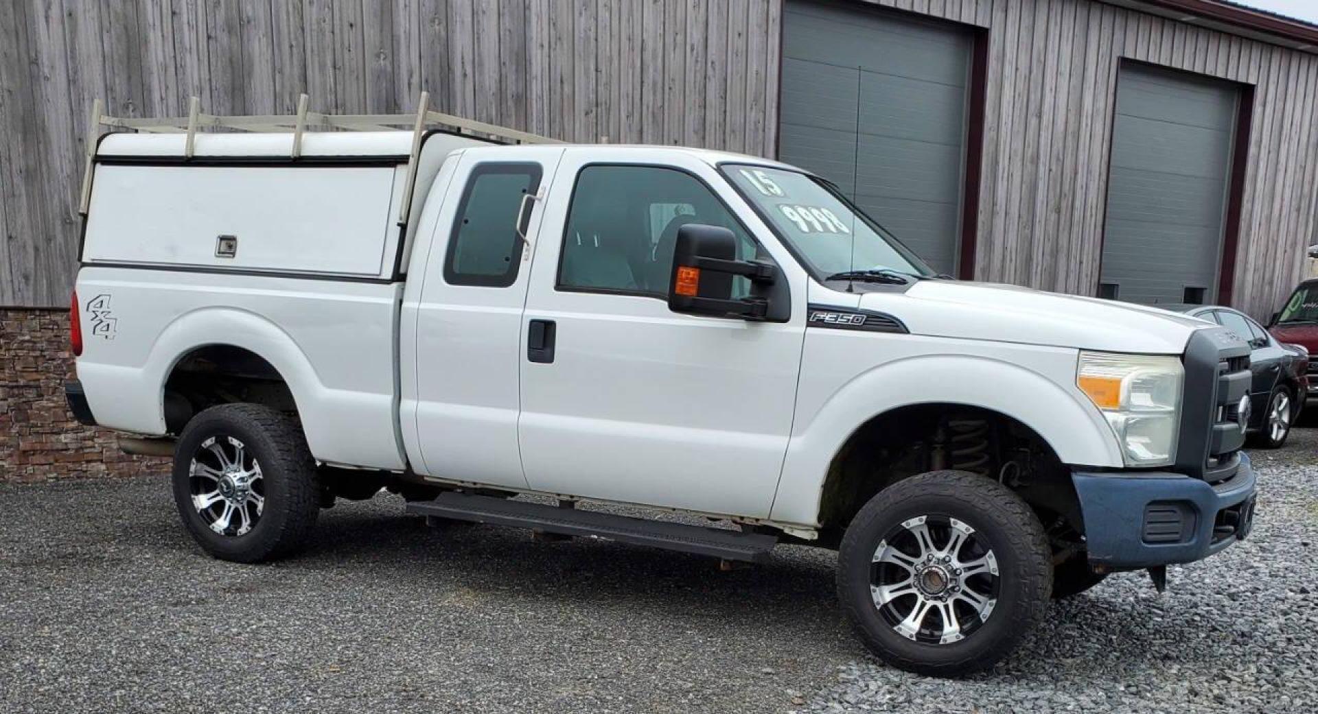 2015 White Ford F-350 Super Duty (1FT7X3B63FE) with an 6.2L V8 6.2L V8 engine, located at 4845 Woodbury Pike, Roaring Springs, PA, (814) 317-5008, (814) 317-5008, 40.250935, -78.366959 - Recently added Raceline wheels! 2015 Ford F-350, Southern Truck, Rust free, 6.2L, V8, 4x4, automatic, power windows/locks, like new tires, work cap and more. Good condition! Rust free undercarriage. Truck has extremely high miles was company owned and severely maintained! Runs great! All maint - Photo#1