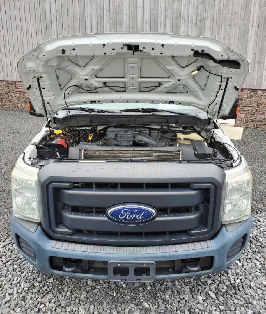 2015 White Ford F-350 Super Duty (1FT7X3B63FE) with an 6.2L V8 6.2L V8 engine, located at 4845 Woodbury Pike, Roaring Springs, PA, (814) 317-5008, (814) 317-5008, 40.250935, -78.366959 - Recently added Raceline wheels! 2015 Ford F-350, Southern Truck, Rust free, 6.2L, V8, 4x4, automatic, power windows/locks, like new tires, work cap and more. Good condition! Rust free undercarriage. Truck has extremely high miles was company owned and severely maintained! Runs great! All maint - Photo#6