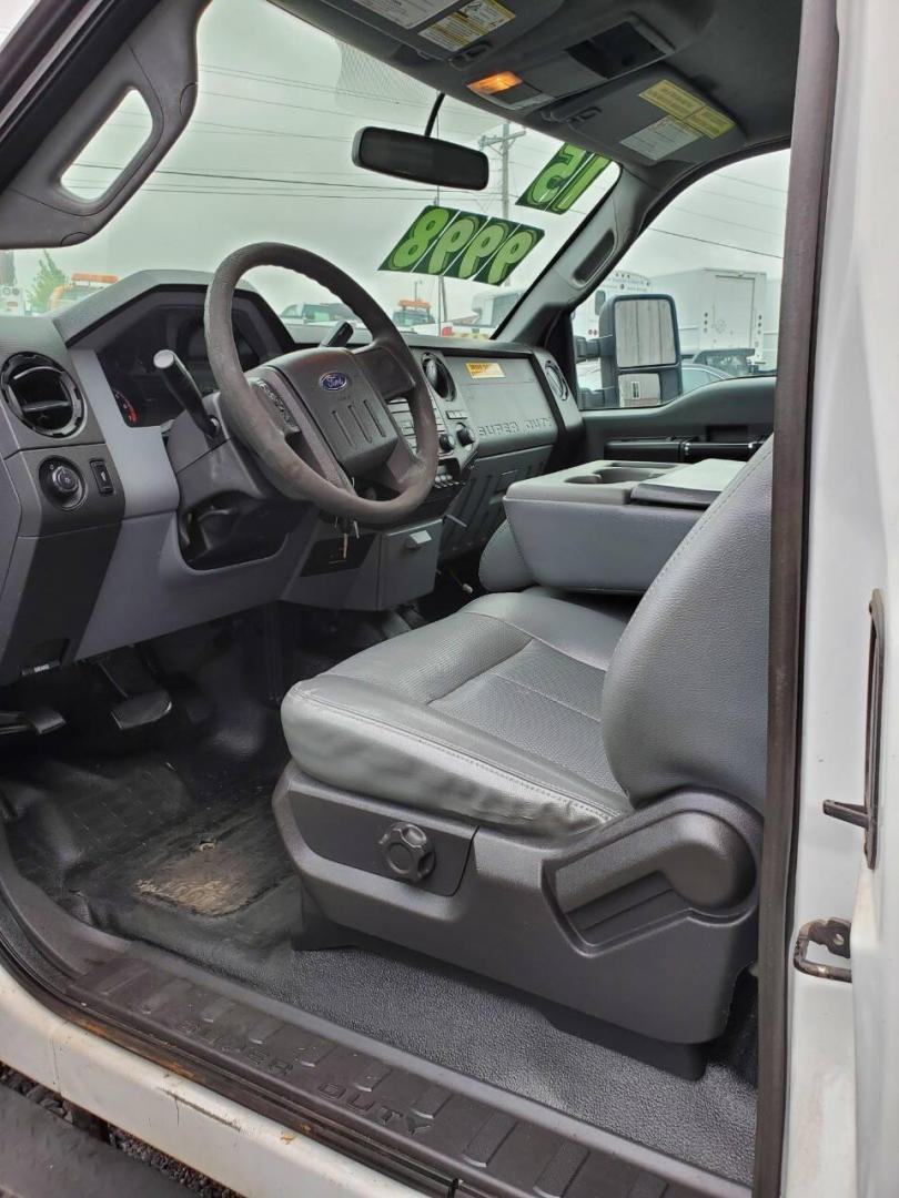 2015 White Ford F-350 Super Duty (1FT7X3B63FE) with an 6.2L V8 6.2L V8 engine, located at 4845 Woodbury Pike, Roaring Springs, PA, (814) 317-5008, (814) 317-5008, 40.250935, -78.366959 - Recently added Raceline wheels! 2015 Ford F-350, Southern Truck, Rust free, 6.2L, V8, 4x4, automatic, power windows/locks, like new tires, work cap and more. Good condition! Rust free undercarriage. Truck has extremely high miles was company owned and severely maintained! Runs great! All maint - Photo#9