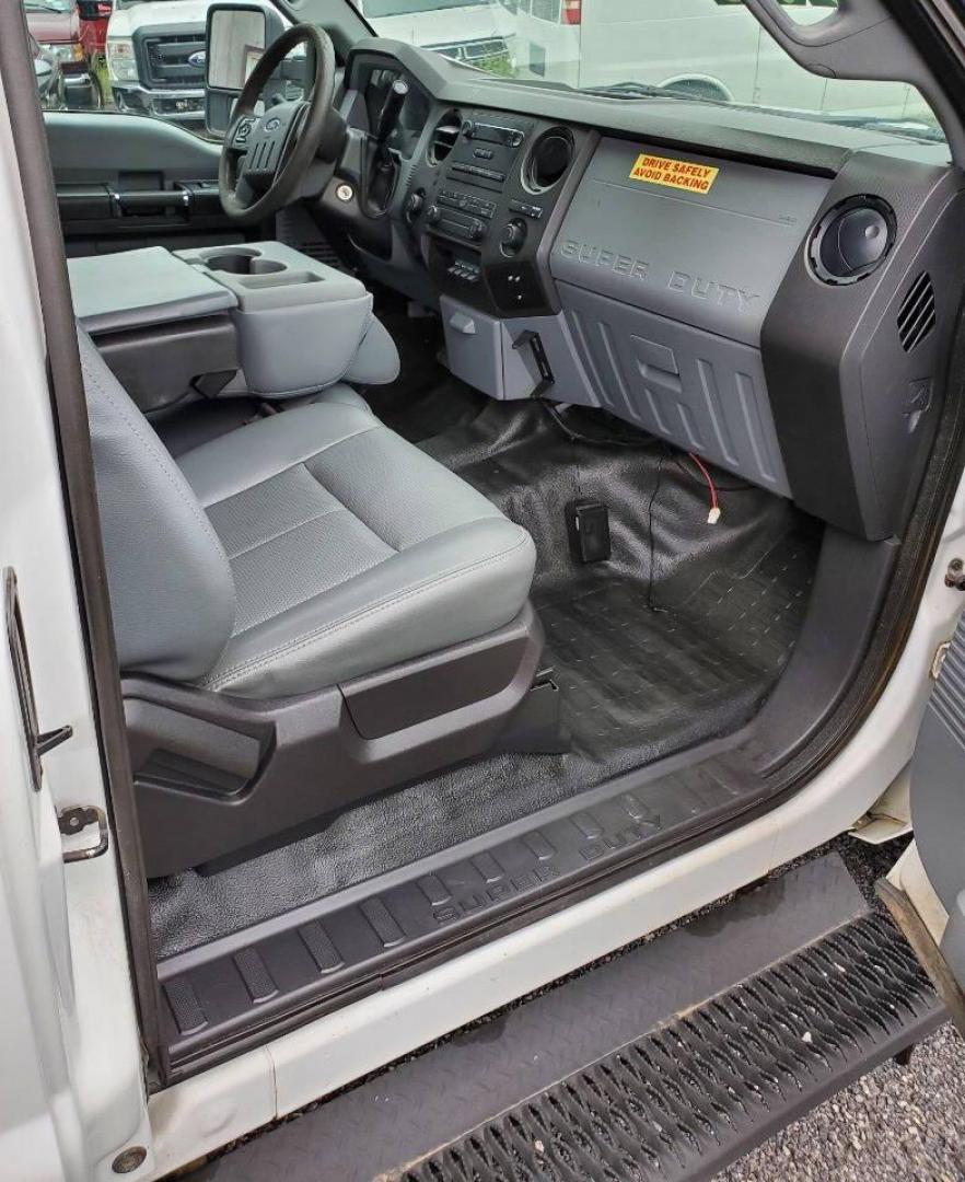2015 White Ford F-350 Super Duty (1FT7X3B63FE) with an 6.2L V8 6.2L V8 engine, located at 4845 Woodbury Pike, Roaring Springs, PA, (814) 317-5008, (814) 317-5008, 40.250935, -78.366959 - Recently added Raceline wheels! 2015 Ford F-350, Southern Truck, Rust free, 6.2L, V8, 4x4, automatic, power windows/locks, like new tires, work cap and more. Good condition! Rust free undercarriage. Truck has extremely high miles was company owned and severely maintained! Runs great! All maint - Photo#13