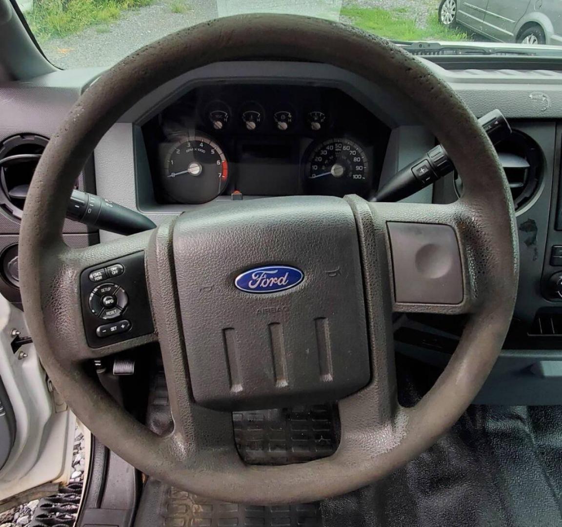 2015 White Ford F-350 Super Duty (1FT7X3B63FE) with an 6.2L V8 6.2L V8 engine, located at 4845 Woodbury Pike, Roaring Springs, PA, (814) 317-5008, (814) 317-5008, 40.250935, -78.366959 - Recently added Raceline wheels! 2015 Ford F-350, Southern Truck, Rust free, 6.2L, V8, 4x4, automatic, power windows/locks, like new tires, work cap and more. Good condition! Rust free undercarriage. Truck has extremely high miles was company owned and severely maintained! Runs great! All maint - Photo#18