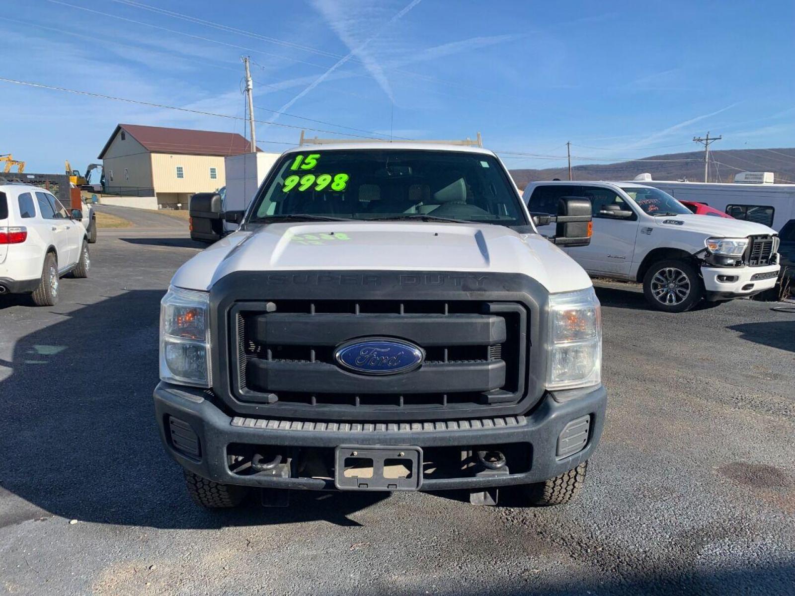 2015 White Ford F-350 Super Duty (1FT7X3B63FE) with an 6.2L V8 6.2L V8 engine, located at 4845 Woodbury Pike, Roaring Springs, PA, (814) 317-5008, (814) 317-5008, 40.250935, -78.366959 - 2015 Ford F-350, Southern Truck, Rust free, 6.2L, V8, 4x4, automatic, power windows/locks, like new tires, work cap and more. Good condition! Rust free undercarriage. Truck has extremely high miles was company owned and severely maintained! Runs great! All maintenance was done. To see a full l - Photo #2