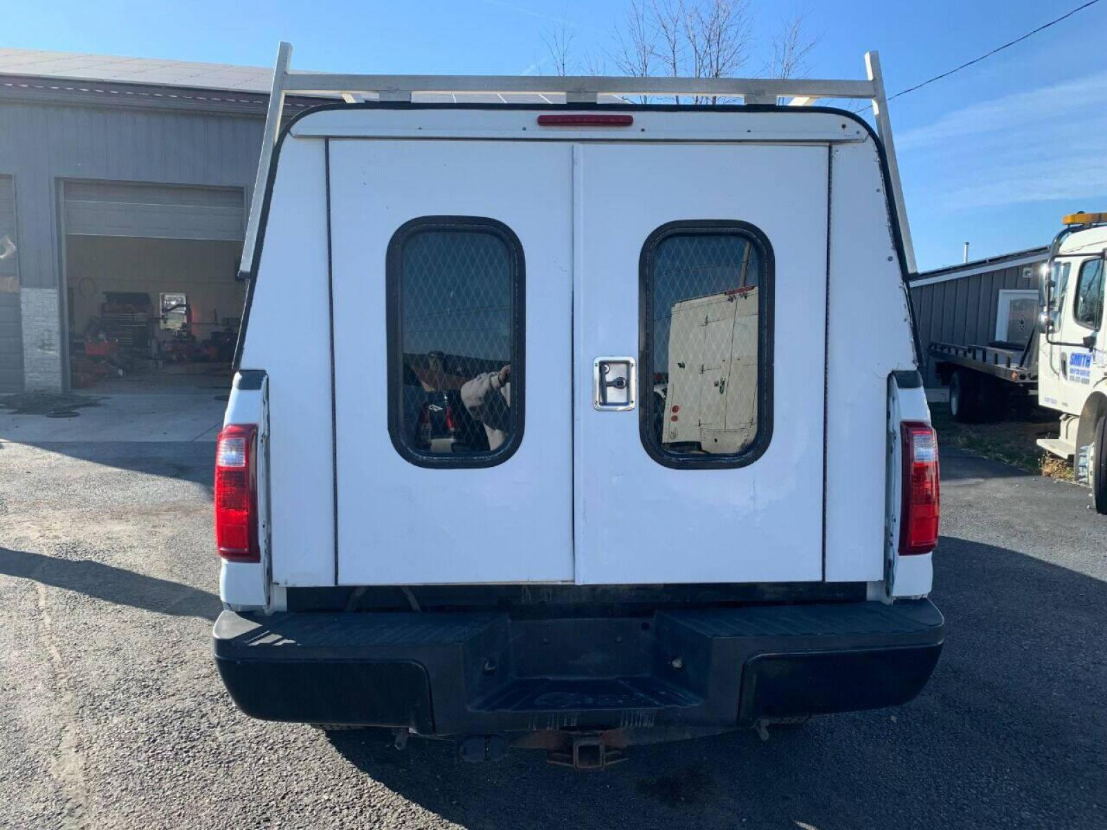 2015 White Ford F-350 Super Duty (1FT7X3B63FE) with an 6.2L V8 6.2L V8 engine, located at 4845 Woodbury Pike, Roaring Springs, PA, (814) 317-5008, (814) 317-5008, 40.250935, -78.366959 - 2015 Ford F-350, Southern Truck, Rust free, 6.2L, V8, 4x4, automatic, power windows/locks, like new tires, work cap and more. Good condition! Rust free undercarriage. Truck has extremely high miles was company owned and severely maintained! Runs great! All maintenance was done. To see a full l - Photo #3