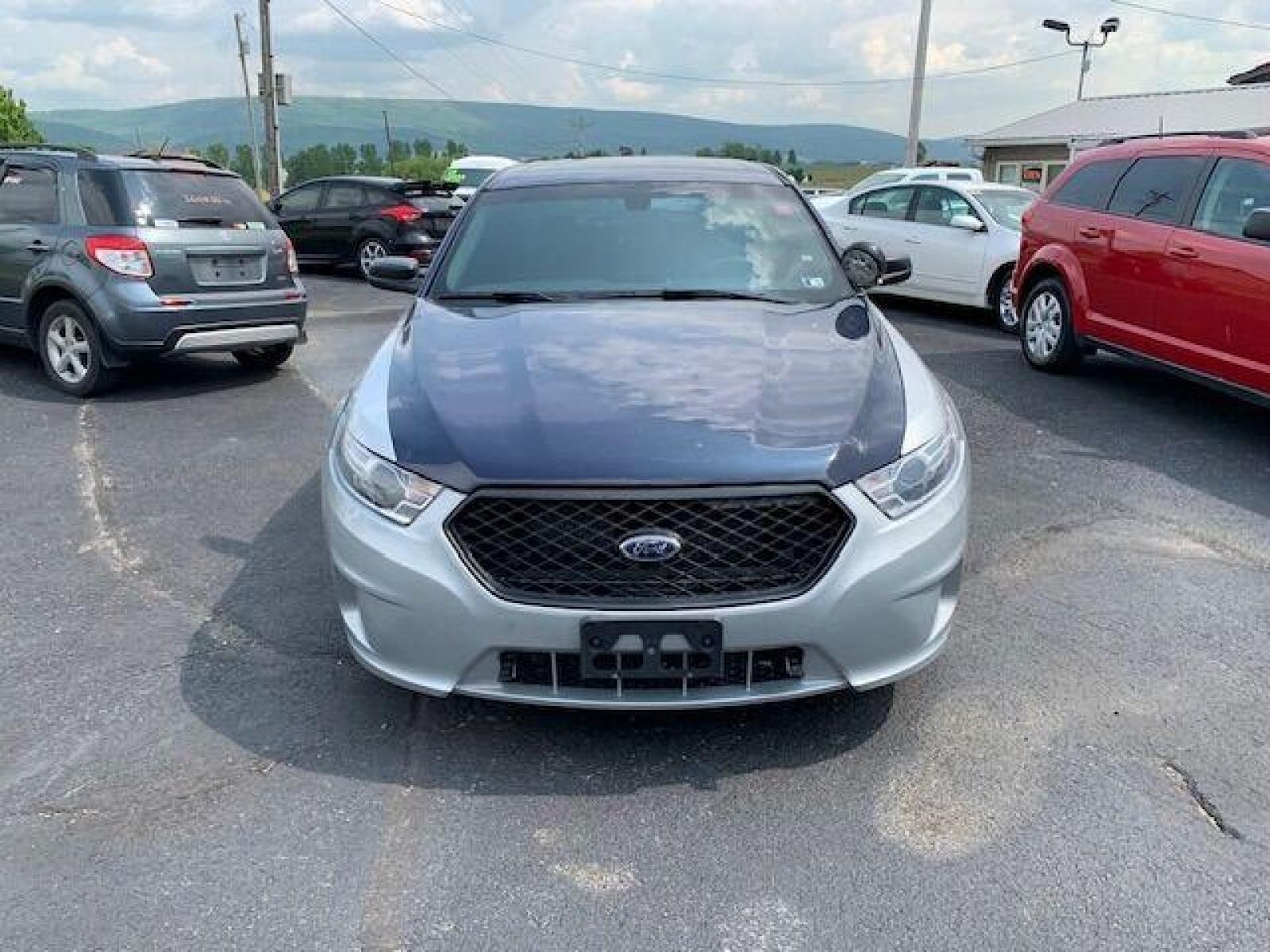 2016 Silver Ford Taurus (1FAHP2MK7GG) with an 3.7L V6 3.7L V6 engine, located at 4845 Woodbury Pike, Roaring Springs, PA, (814) 317-5008, (814) 317-5008, 40.250935, -78.366959 - 2016 Ford Taurus Police Sedan, automatic, AWD, 3.7L, V6, 152k, Southern vehicle, 1 owner, rear back up, like new tires, new inspection. Well maintained! If interested, please call 814-317-5008 or 814-497-4383. - Photo #1