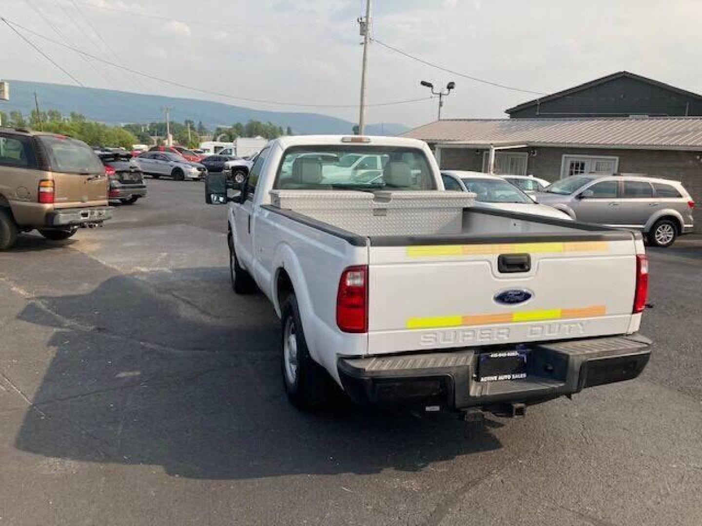 2013 White Ford F-250 Super Duty (1FTBF2A63DE) with an 6.2L V8 6.2L V8 engine, located at 4845 Woodbury Pike, Roaring Springs, PA, (814) 317-5008, (814) 317-5008, 40.250935, -78.366959 - 2013 Ford F250 single cab, 8ft bed, Southern truck, automatic, V8, 6.2L, air conditioning, like new tires, new inspection, 16k. Truck has never been in the rain or snow. Mint condition! Truck has been converted when it was new to Compressed Natural Gas. Truck can be converted back with fuel rail - Photo#3
